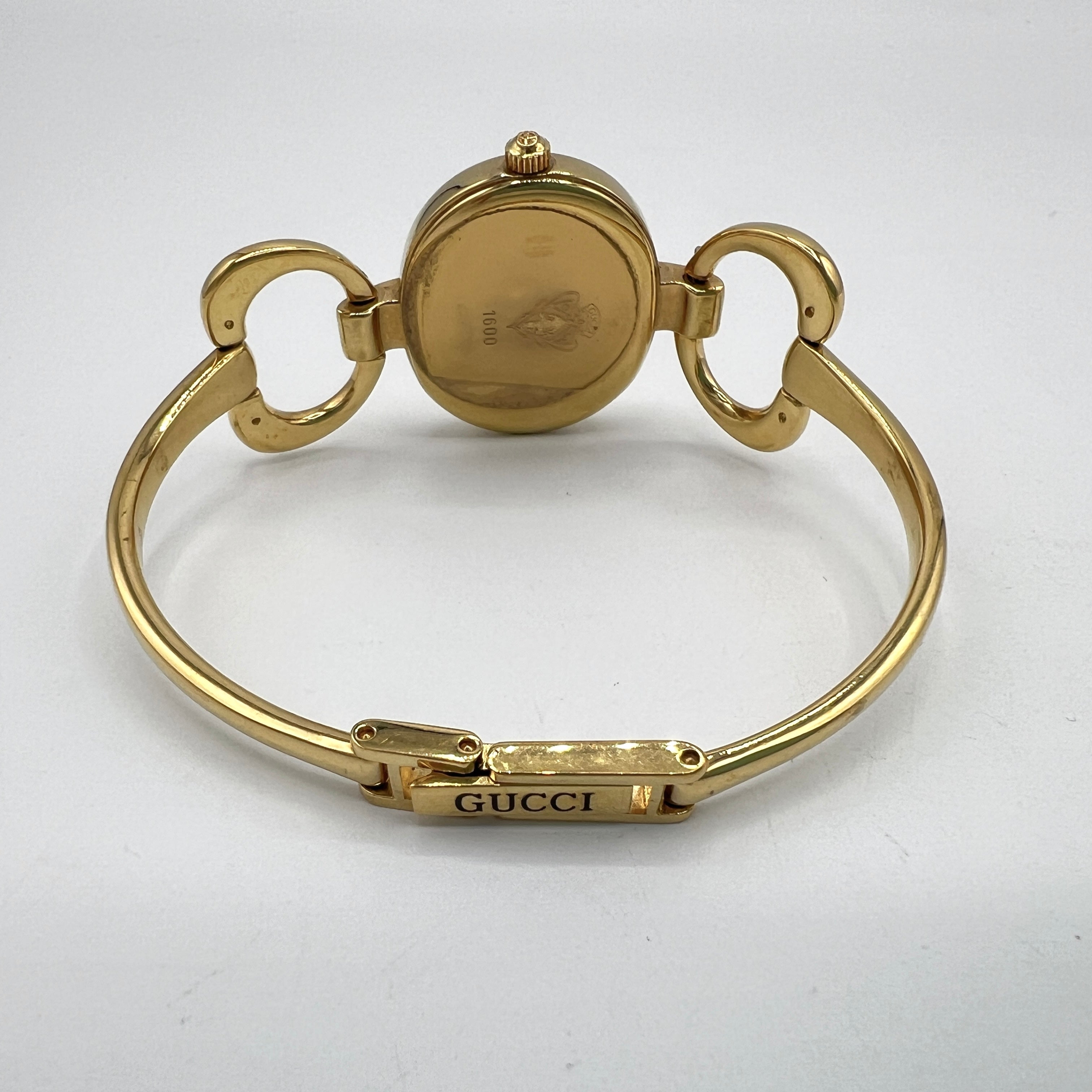 Montre GUCCI 1600 plaqué or Doré