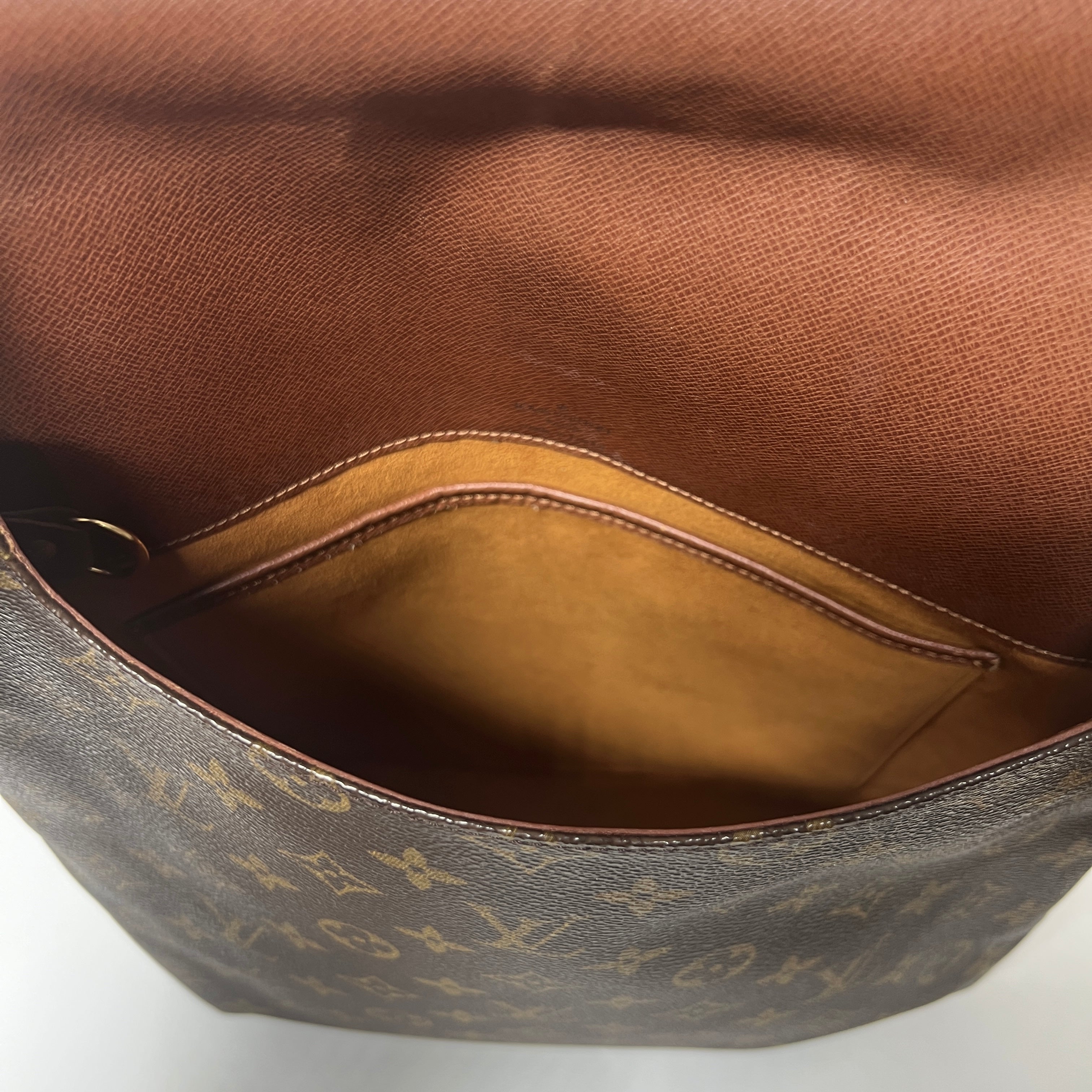 LOUIS VUITTON Tango canvas and brown leather handbag