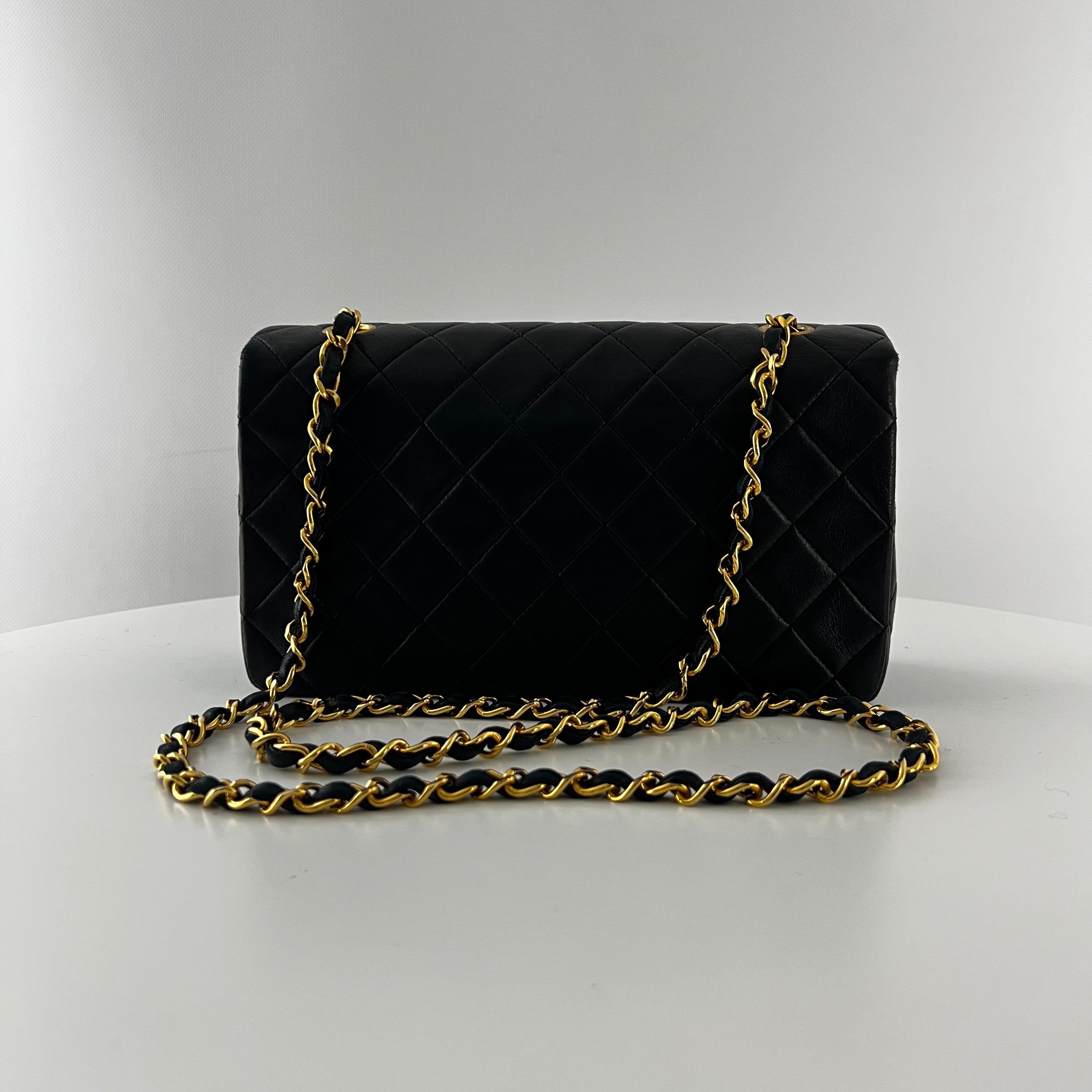 CHANEL Timeless classic quilted single flap black leather handbag
