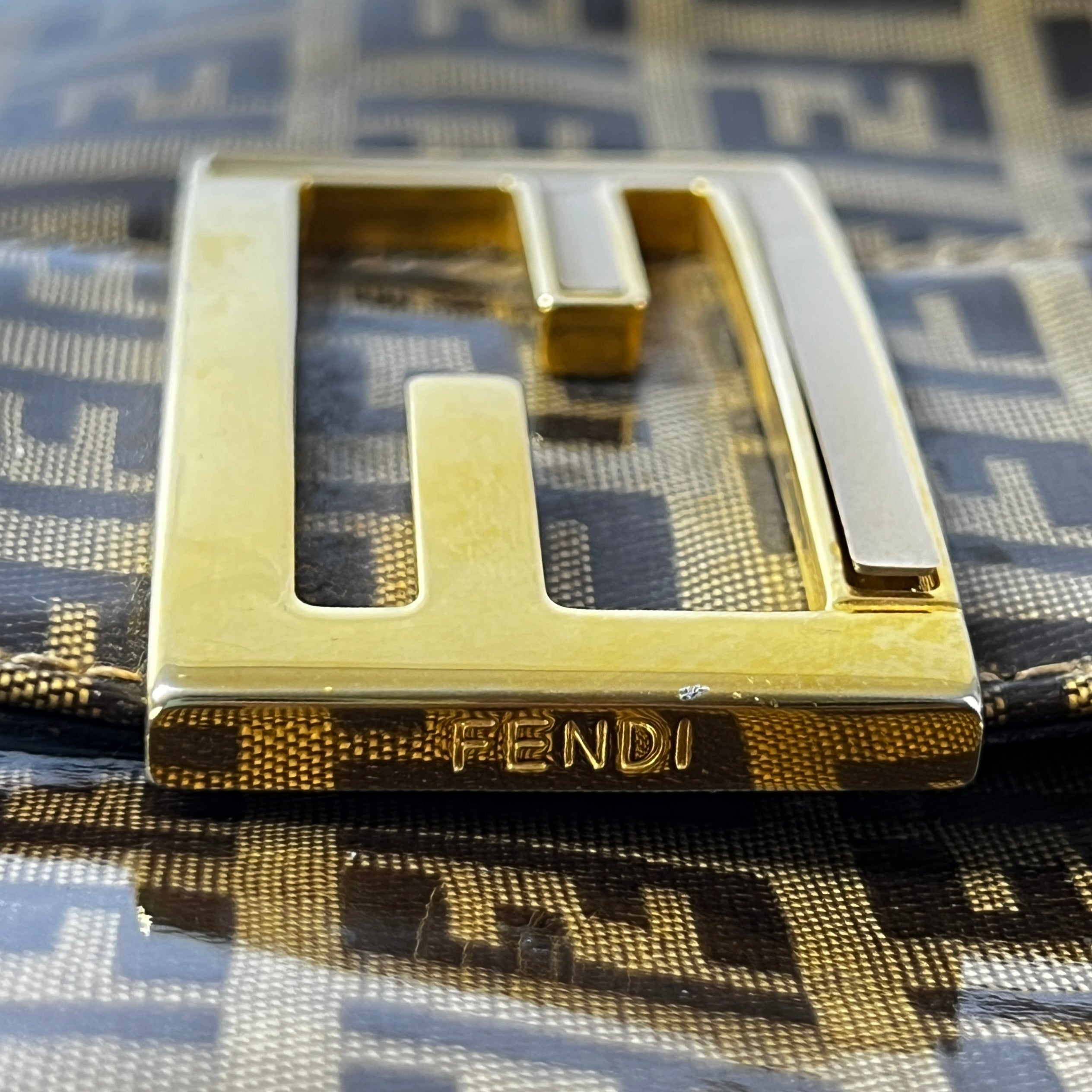 FENDI Croissant handbag in brown patent leather