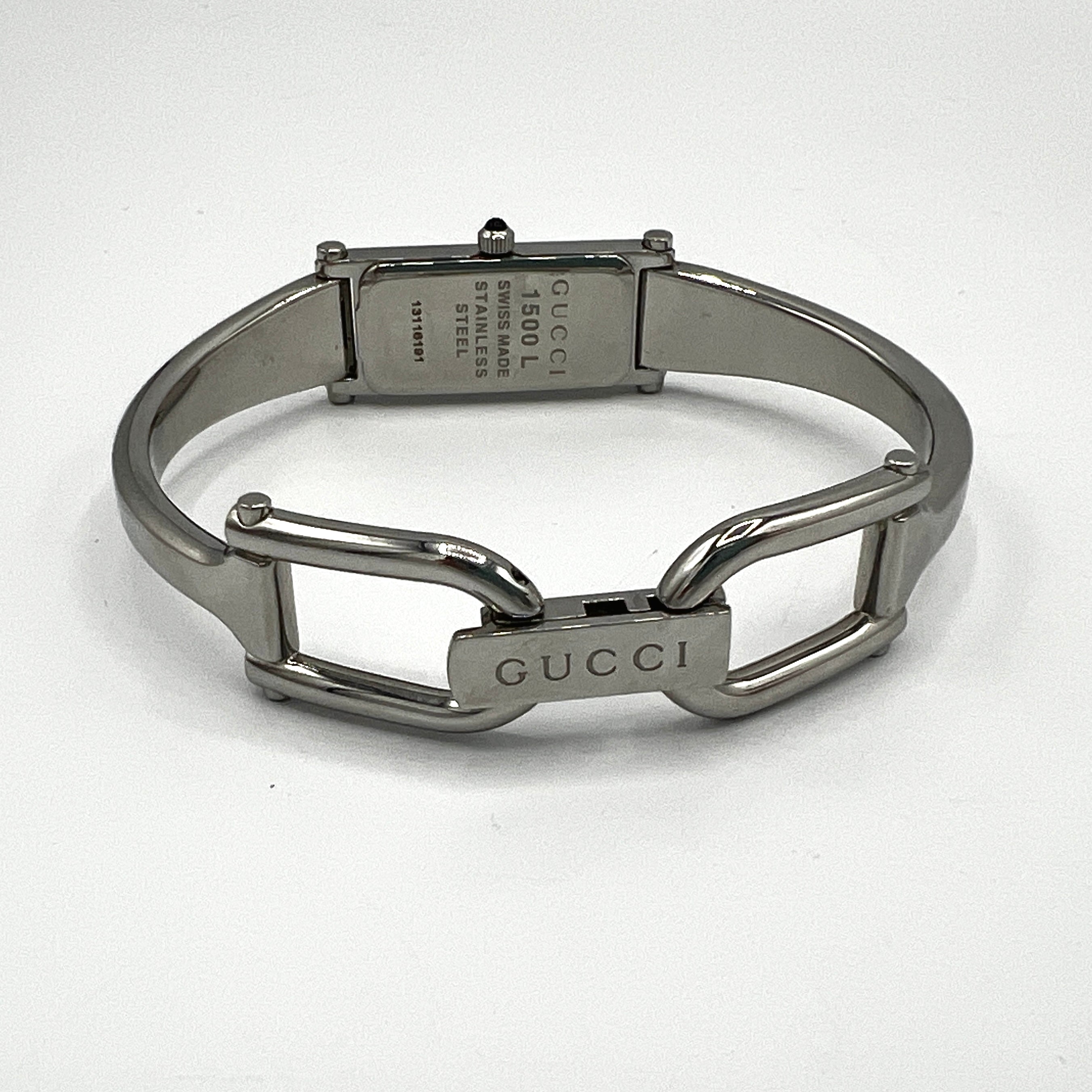 Montre GUCCI 1500 L acier Argenté