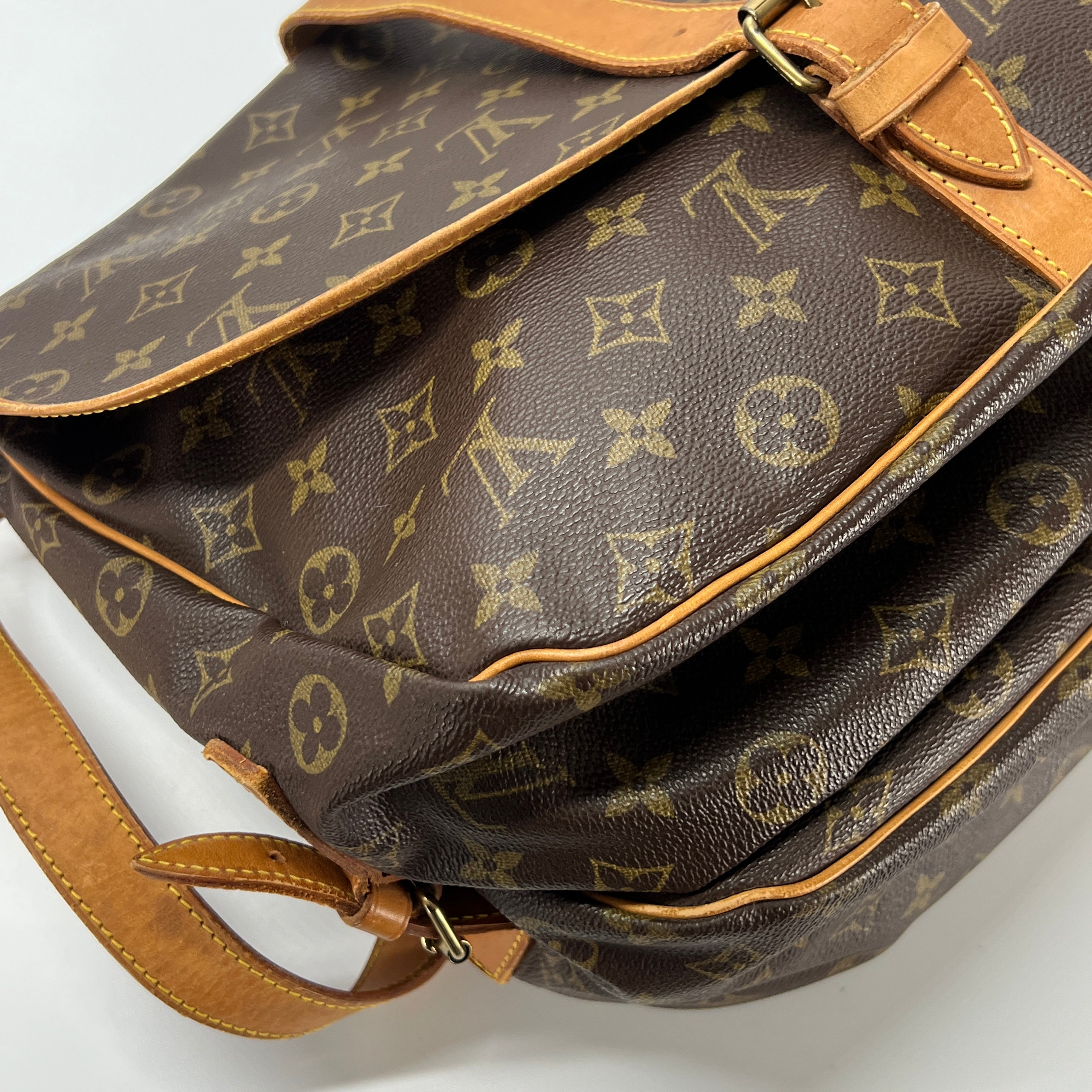 LOUIS VUITTON Saumur 30 canvas and brown leather handbag