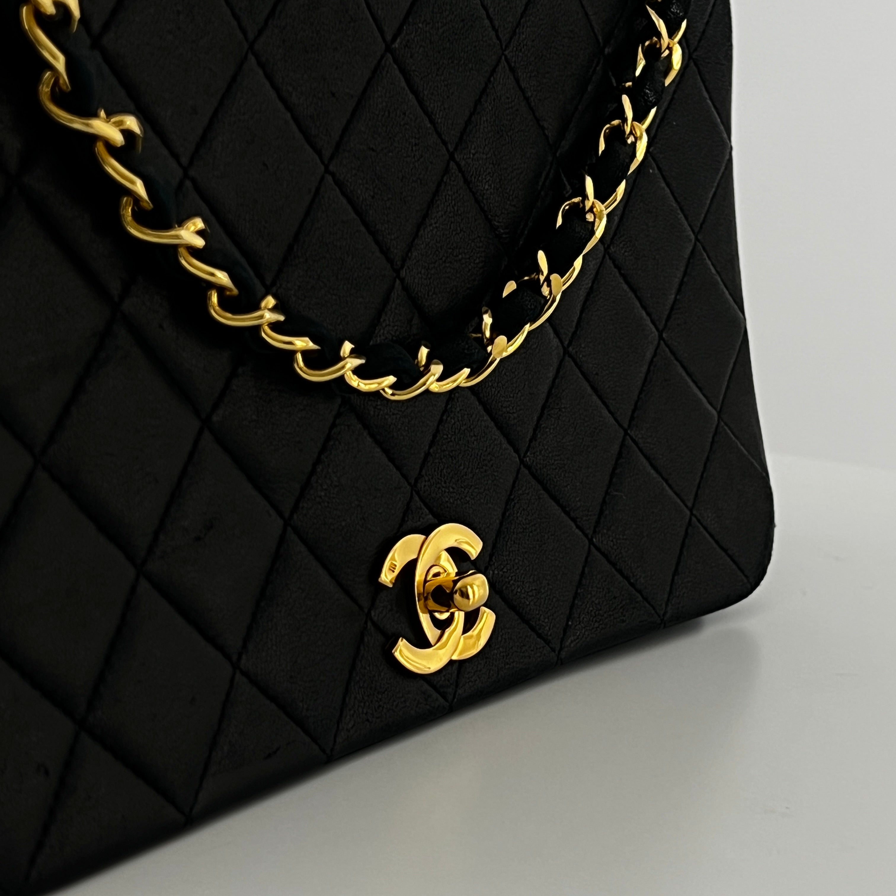 CHANEL Timeless classic quilted single flap black leather handbag