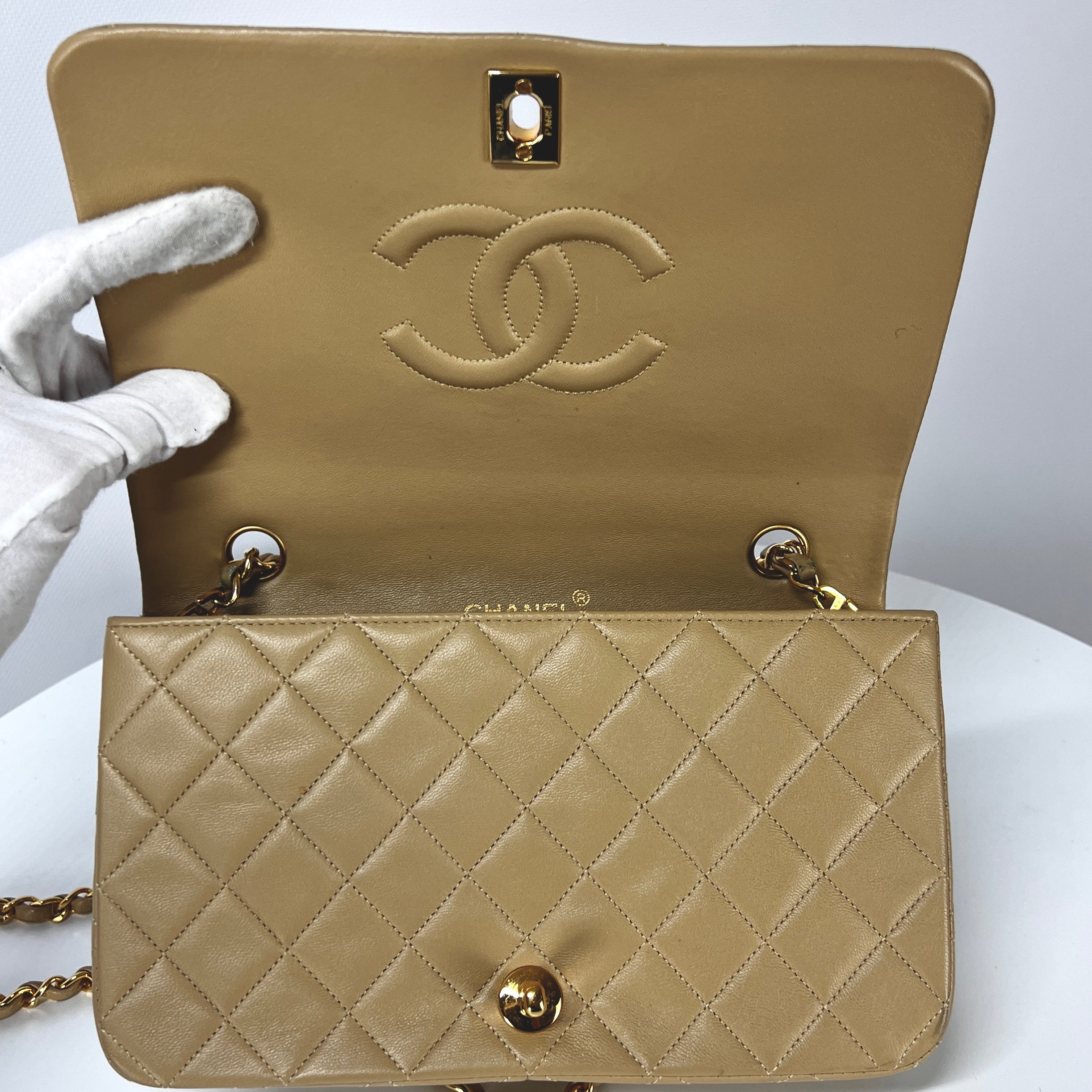 CHANEL Timeless classic quilted single flap beige leather handbag