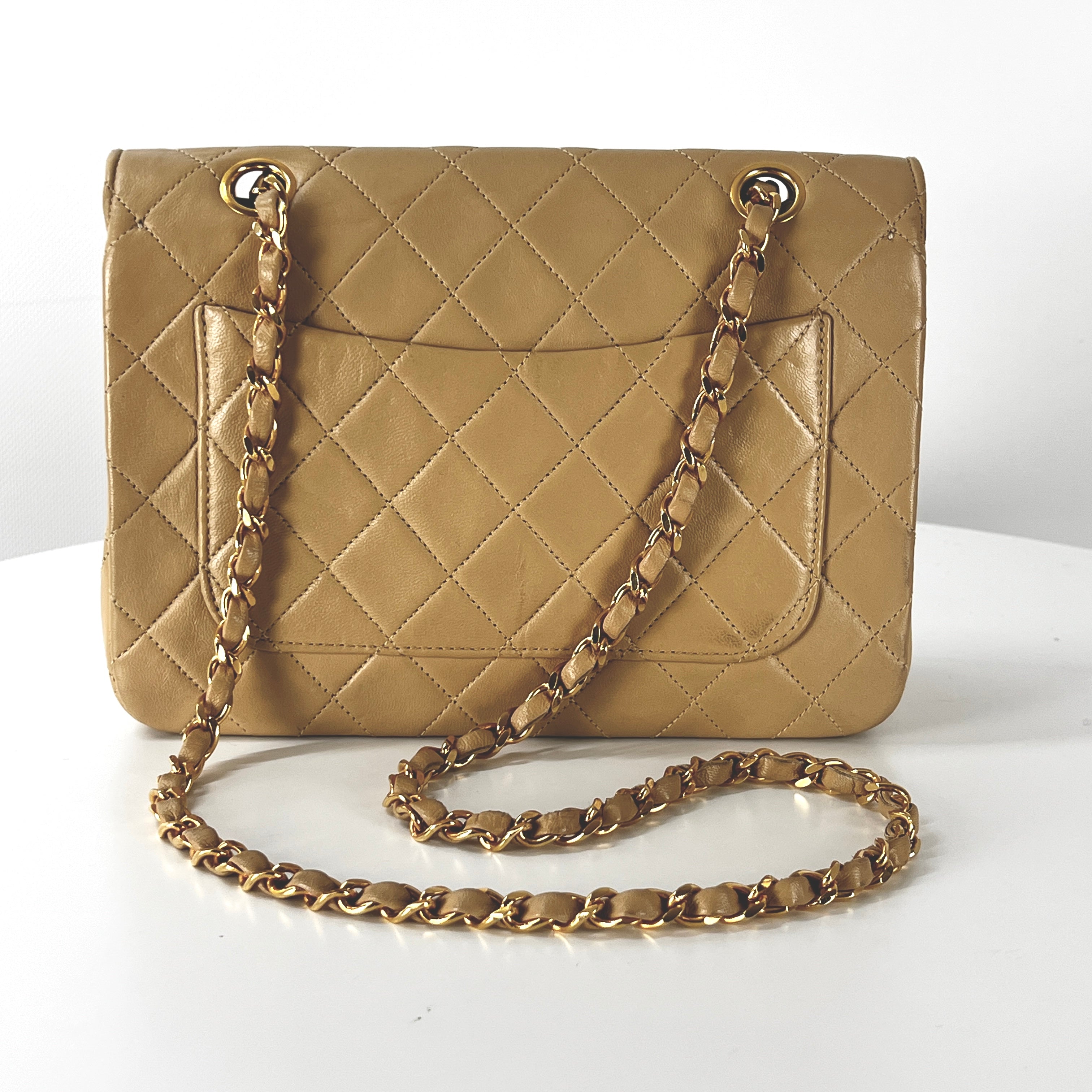 CHANEL Timeless classic quilted single flap beige leather handbag