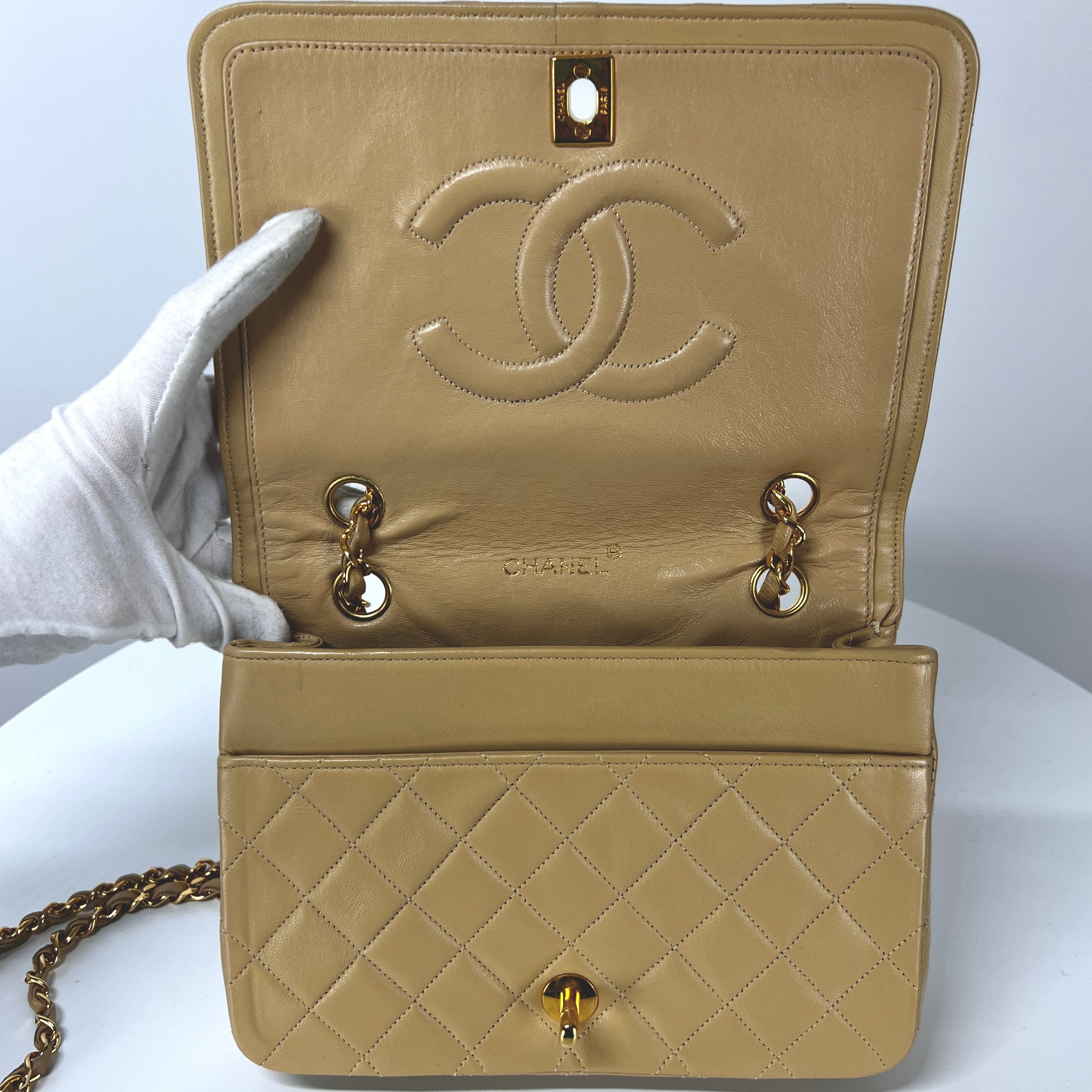 CHANEL Timeless classic quilted single flap beige leather handbag