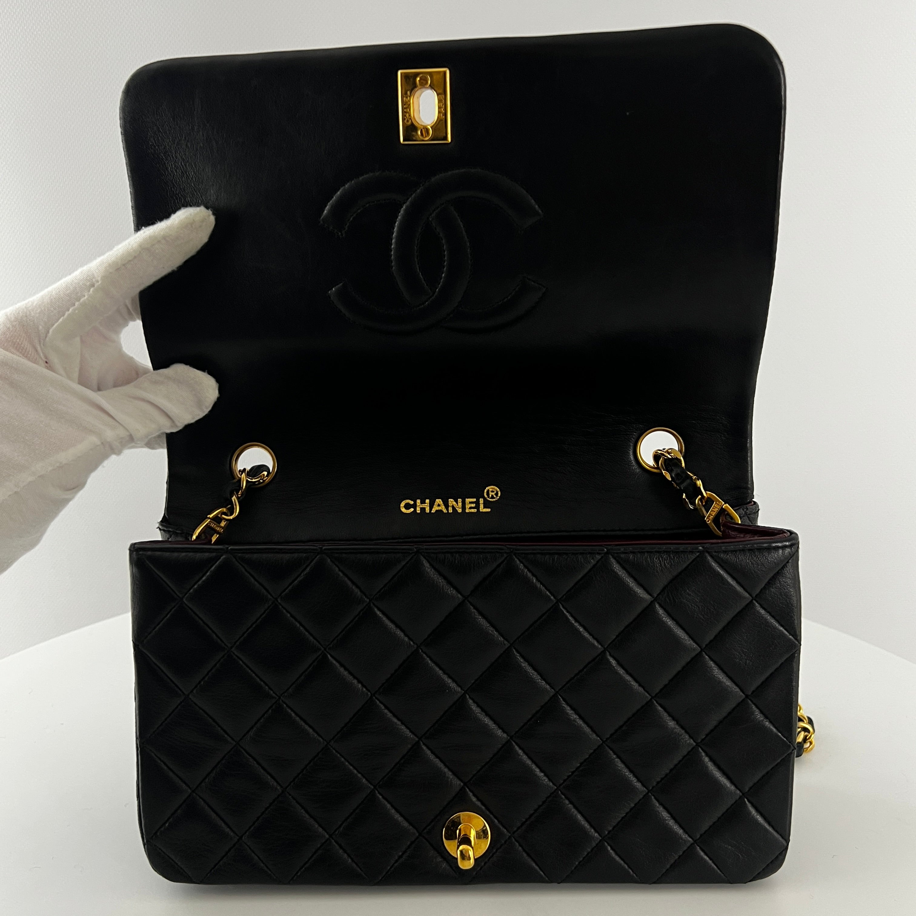 CHANEL Timeless classic quilted single flap black leather handbag