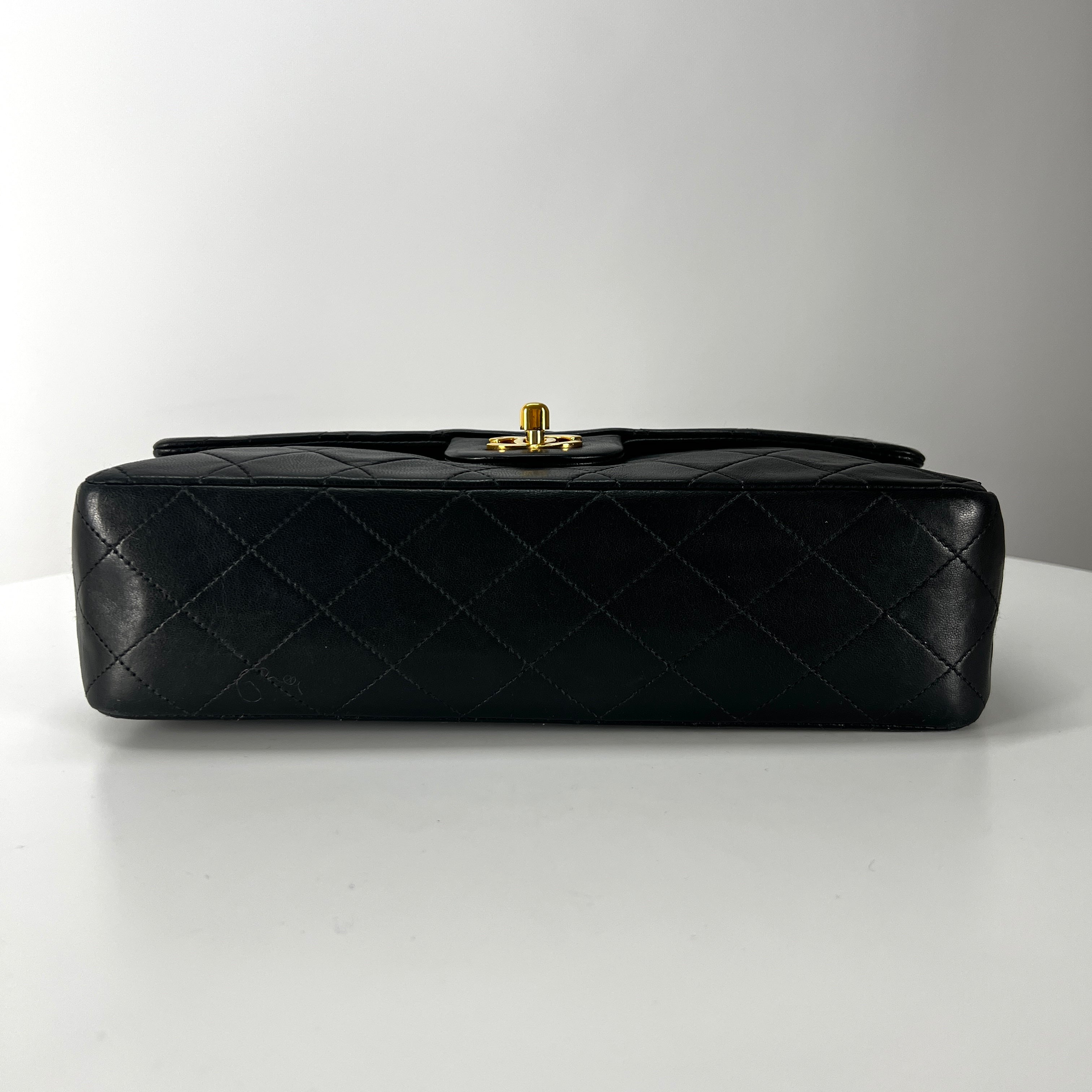 CHANEL Timeless classic medium double flap black leather handbag