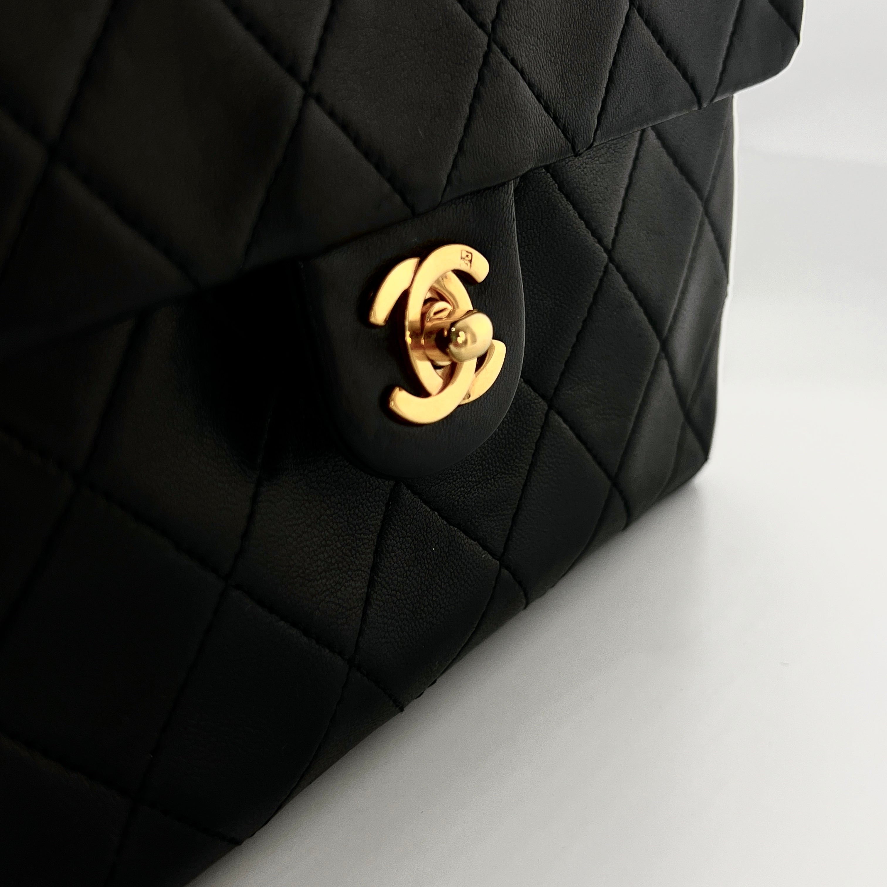 CHANEL Timeless classic mini flap black leather handbag