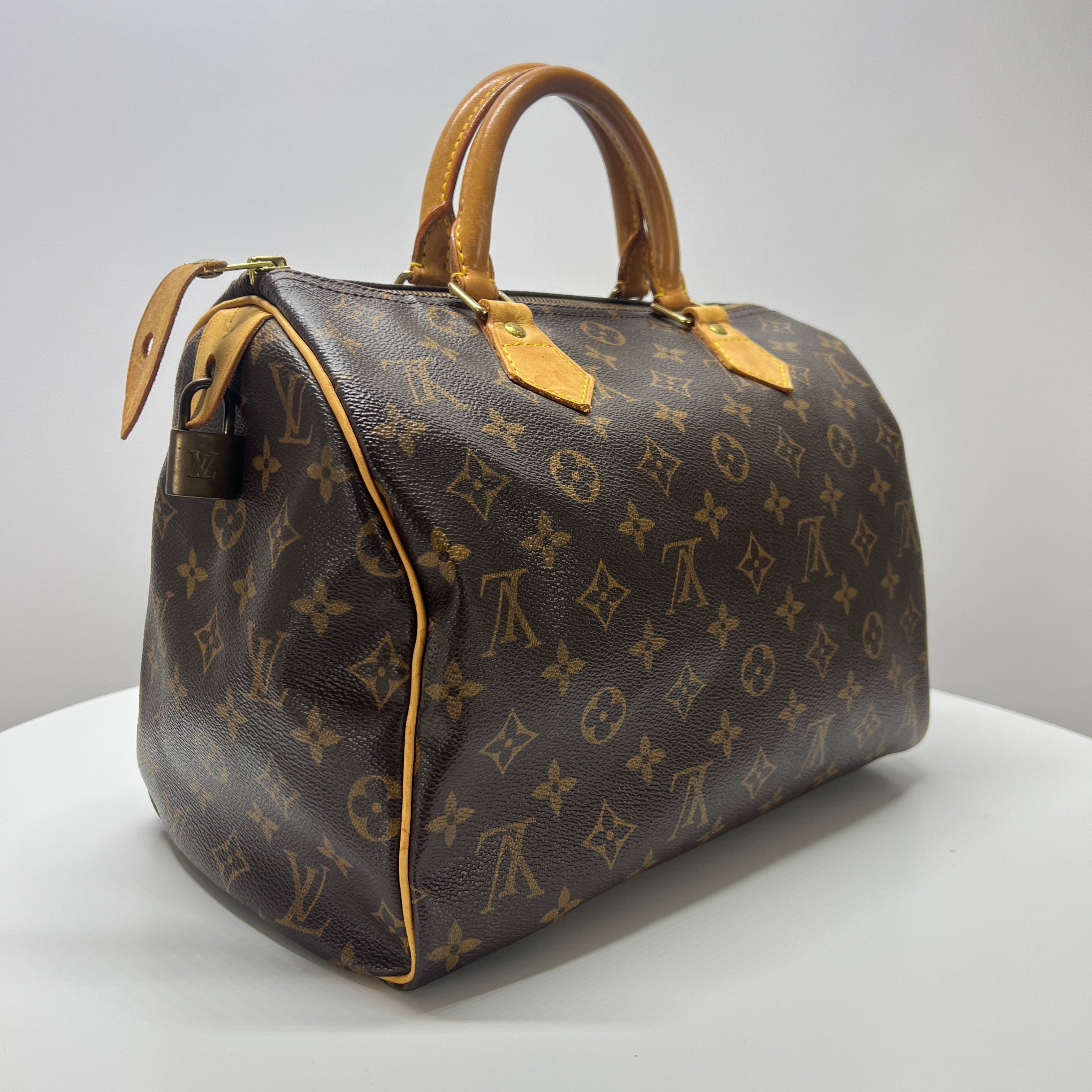 LOUIS VUITTON Speedy 30 canvas and brown leather handbag