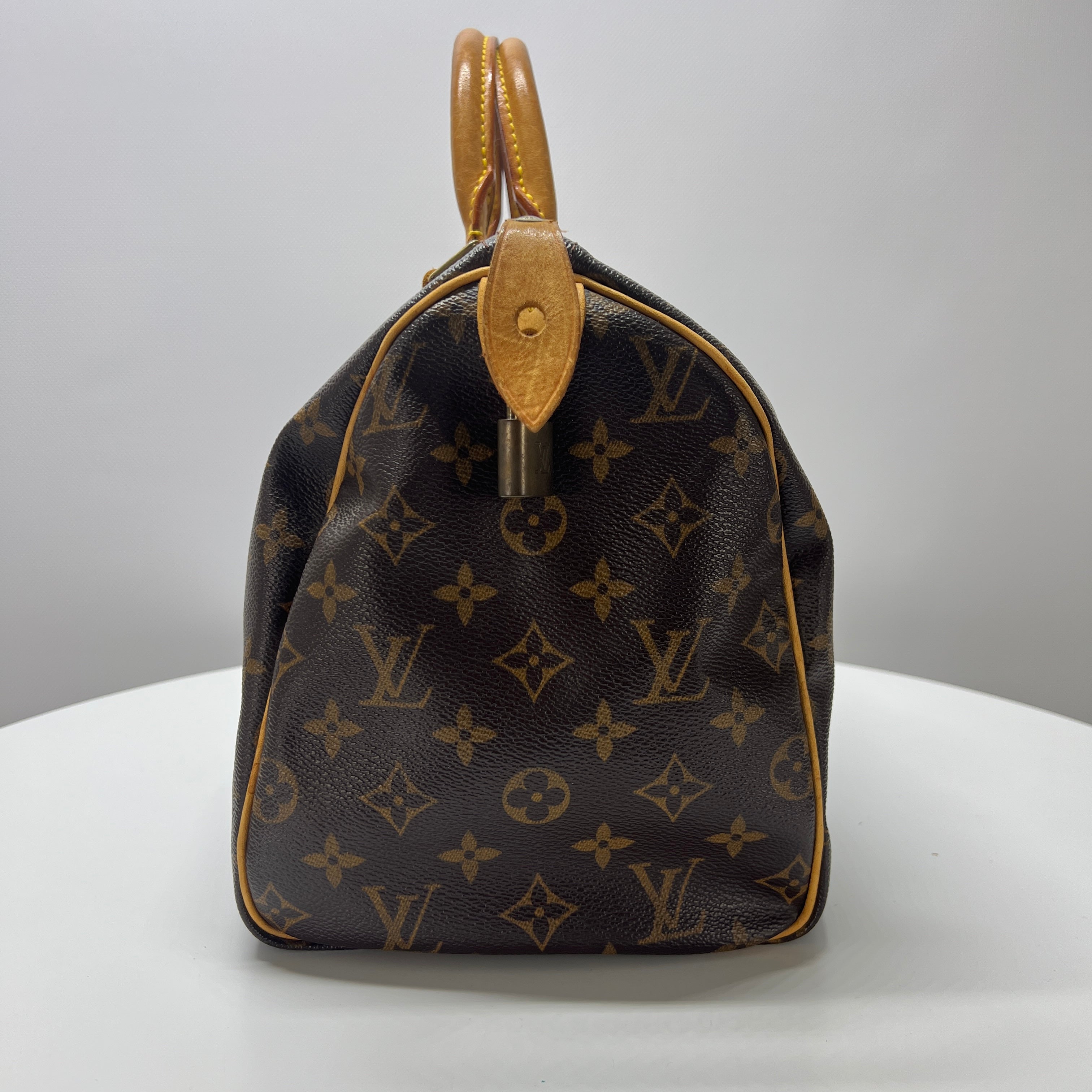 LOUIS VUITTON Speedy 30 canvas and brown leather handbag