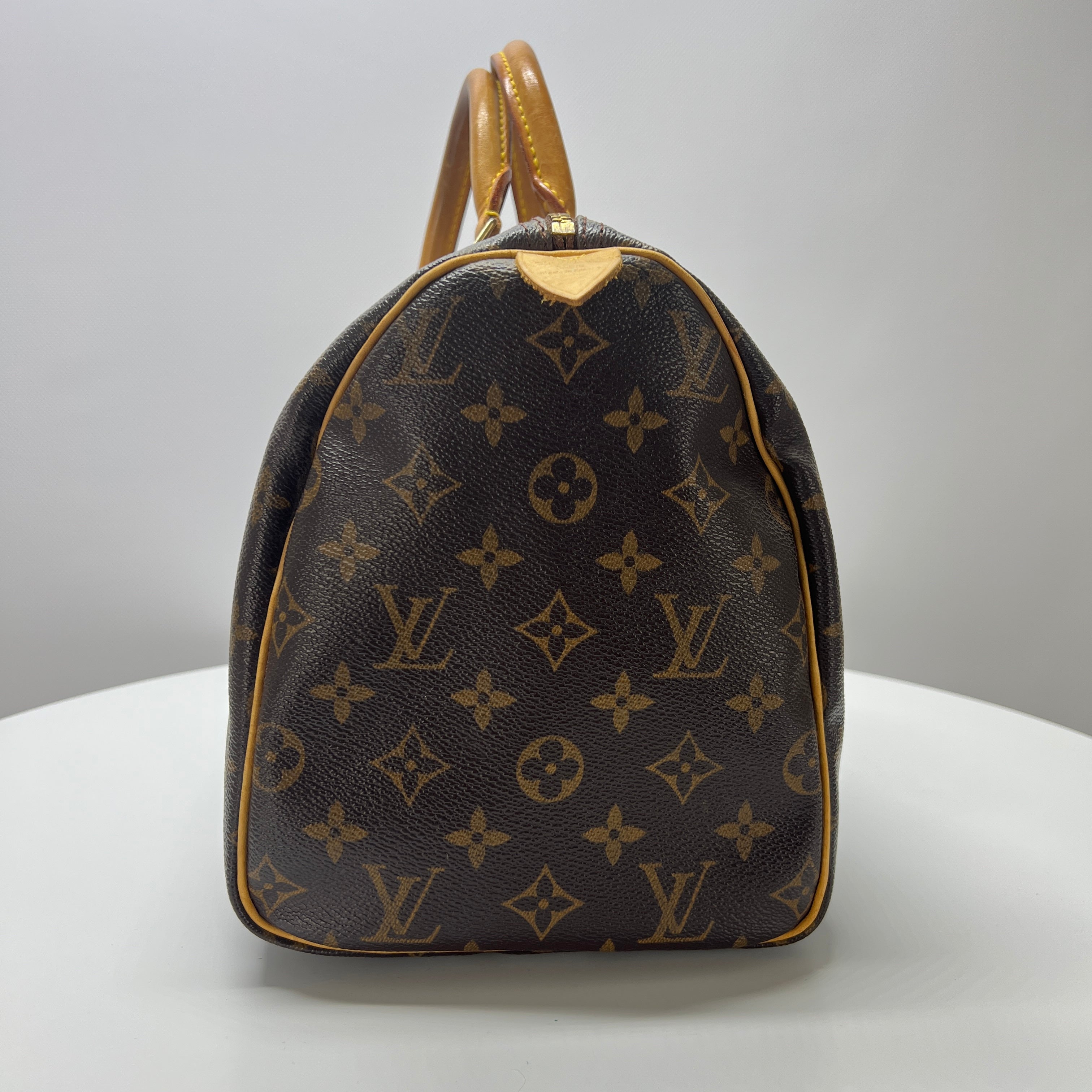 LOUIS VUITTON Speedy 30 canvas and brown leather handbag