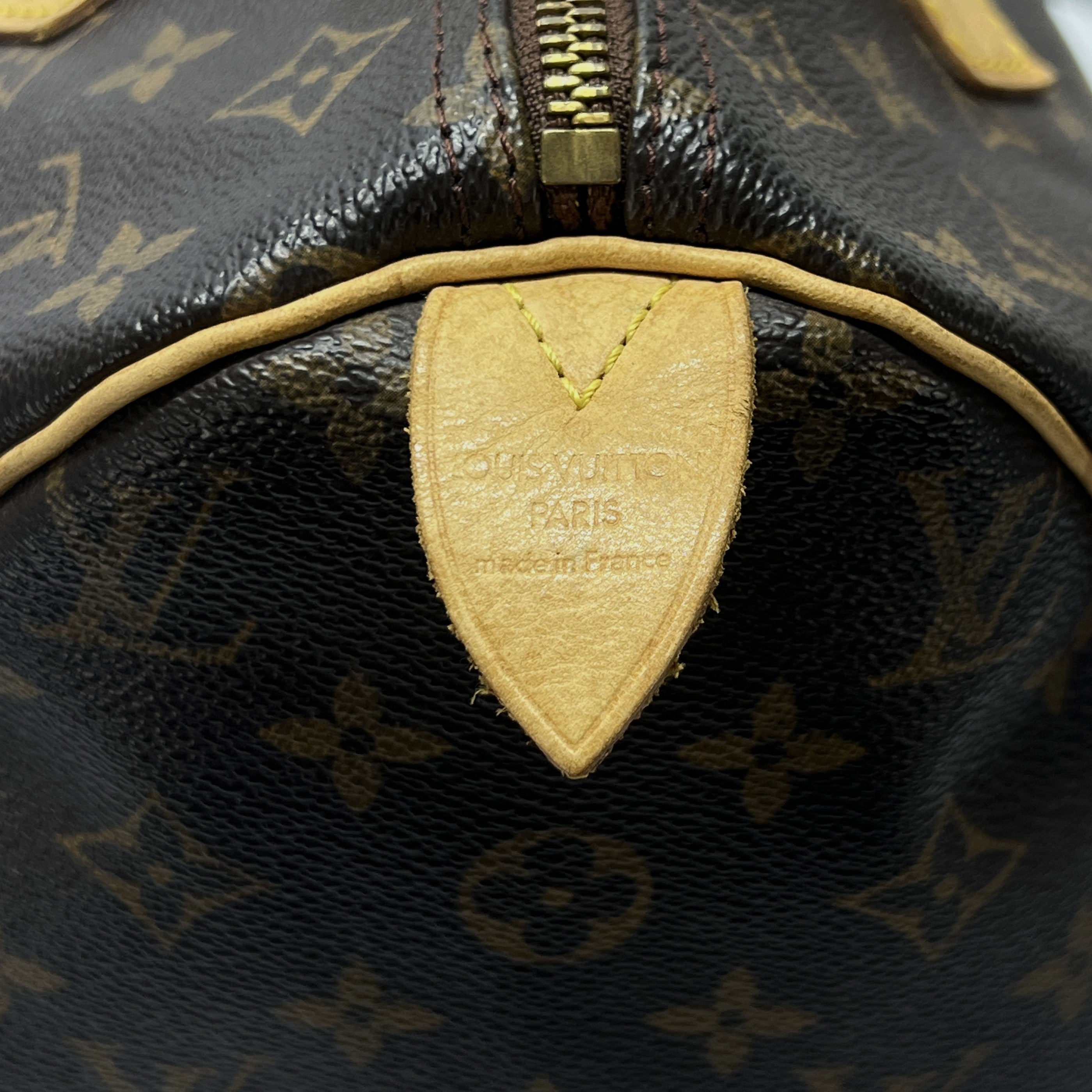 LOUIS VUITTON Speedy 30 canvas and brown leather handbag