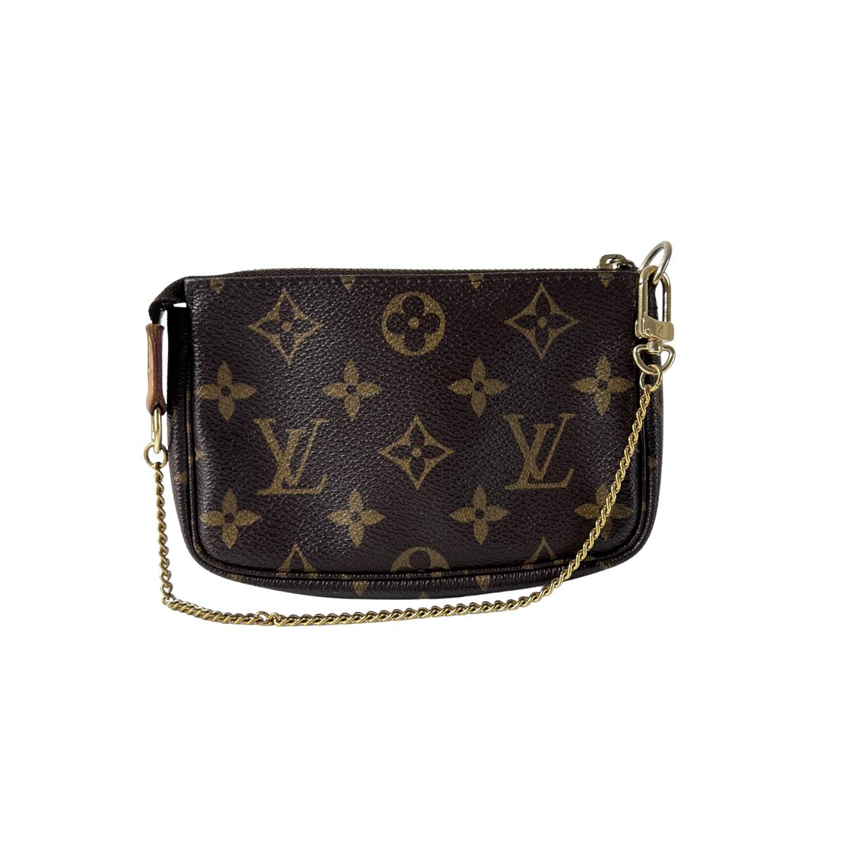 Sac à main LOUIS VUITTON Accessory Pouch toile et cuir marron