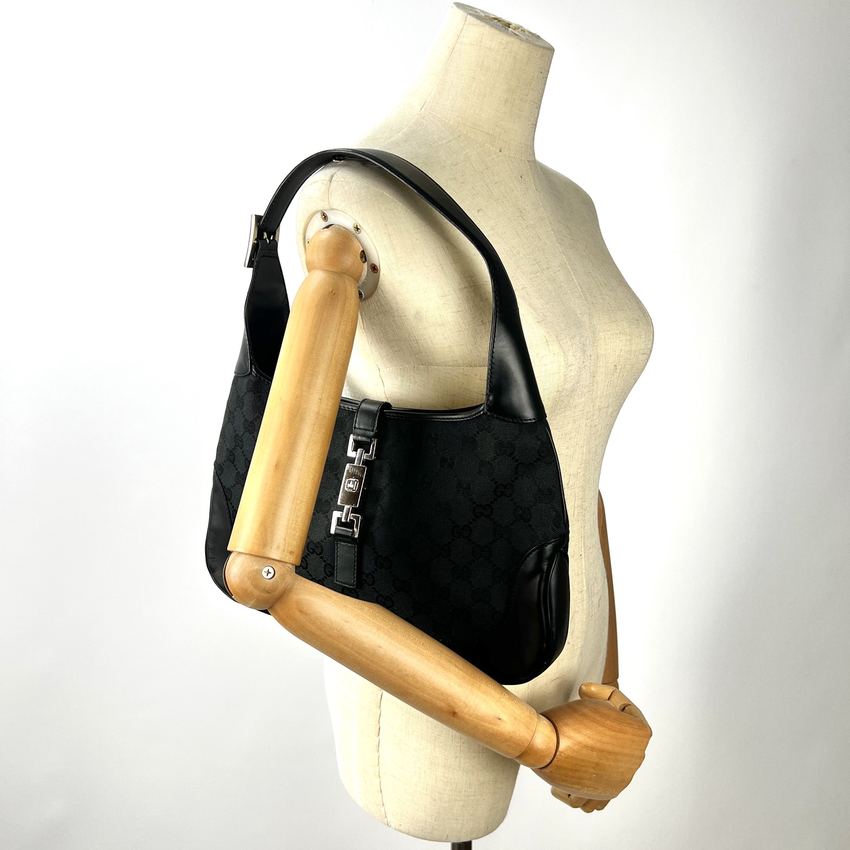 Sac à main GUCCI Jackie toile et cuir noir