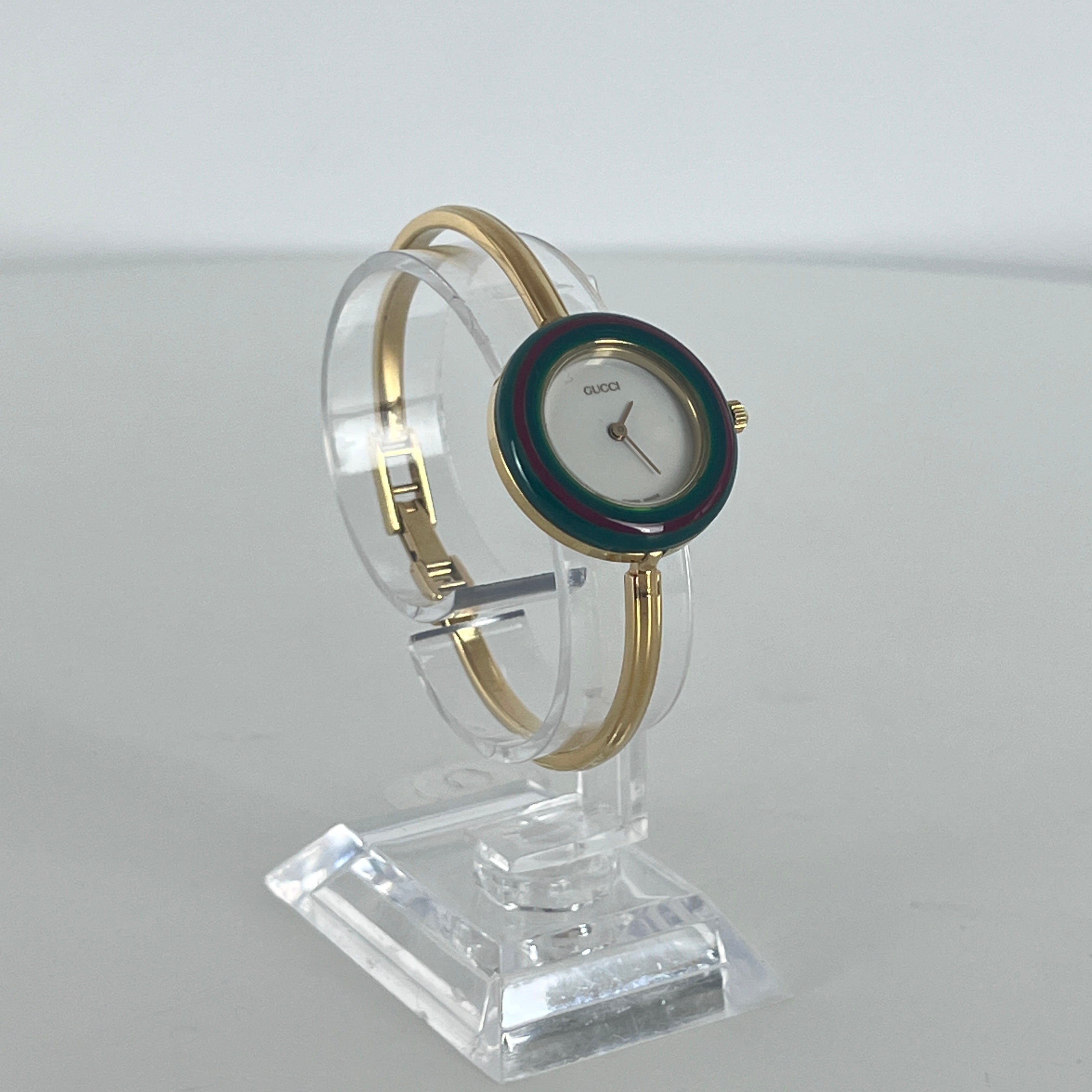 Montre GUCCI 11/12.2 plaqué or doré