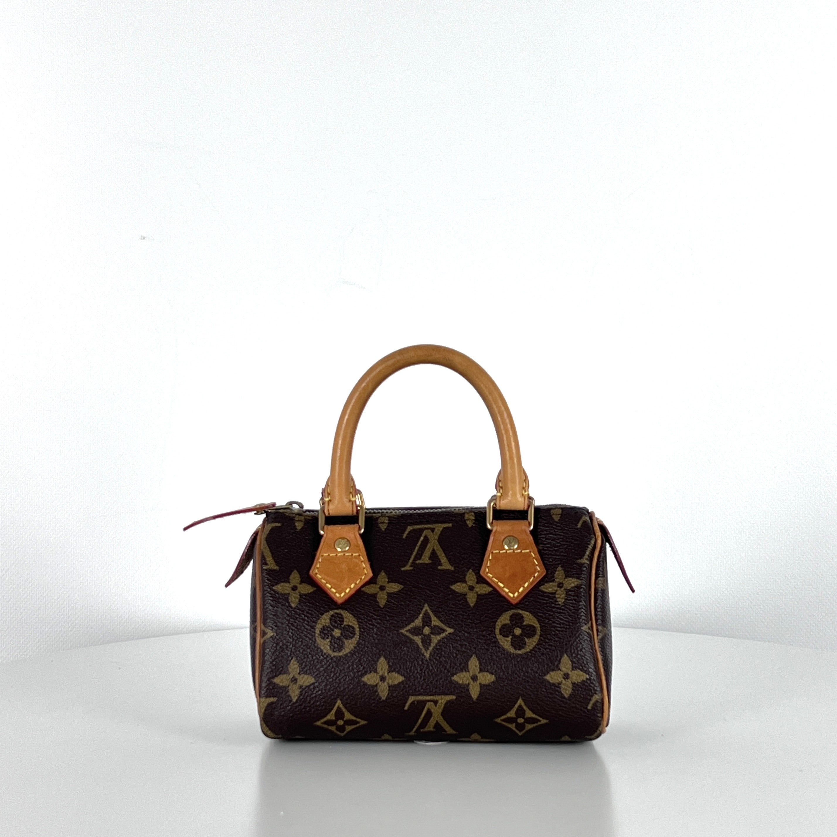 Sac à main LOUIS VUITTON Nano Speedy toile et cuir marron