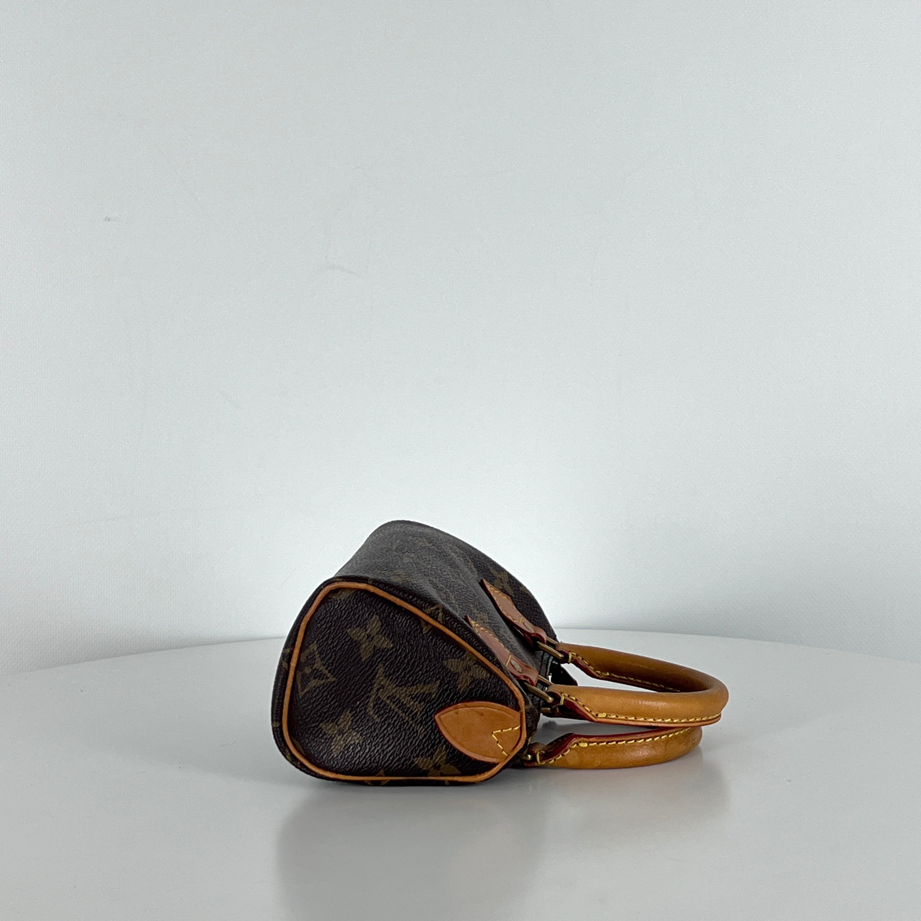 Sac à main LOUIS VUITTON Nano Speedy toile et cuir marron