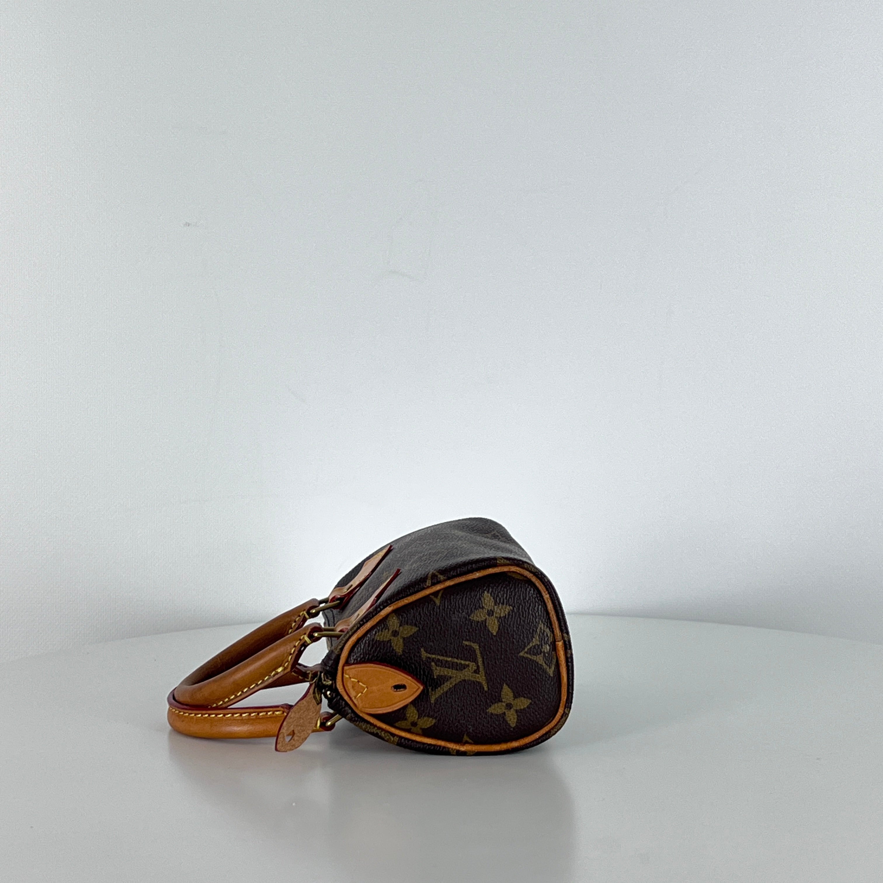 Sac à main LOUIS VUITTON Nano Speedy toile et cuir marron