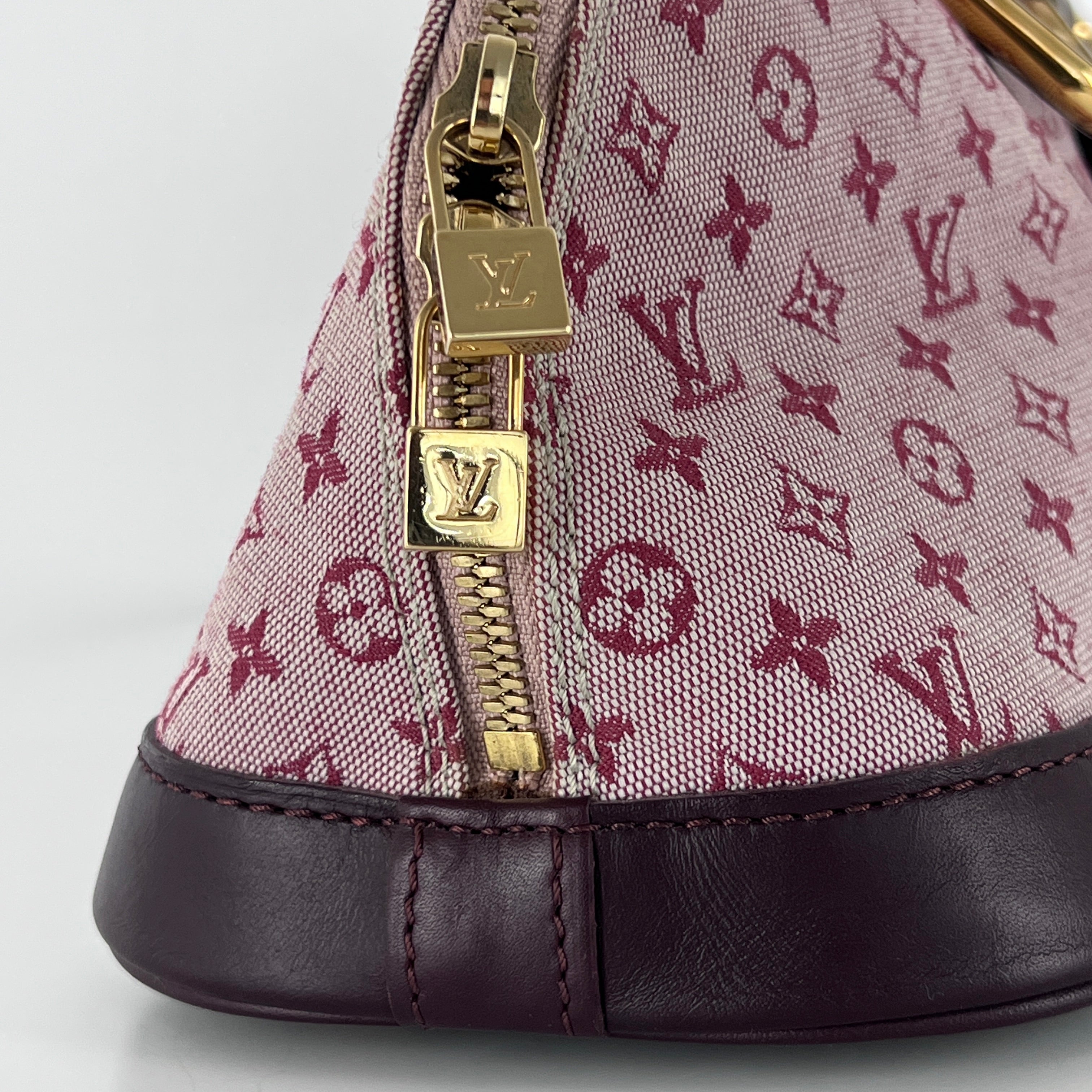 Sac à main LOUIS VUITTON Alma Long toile et cuir rose