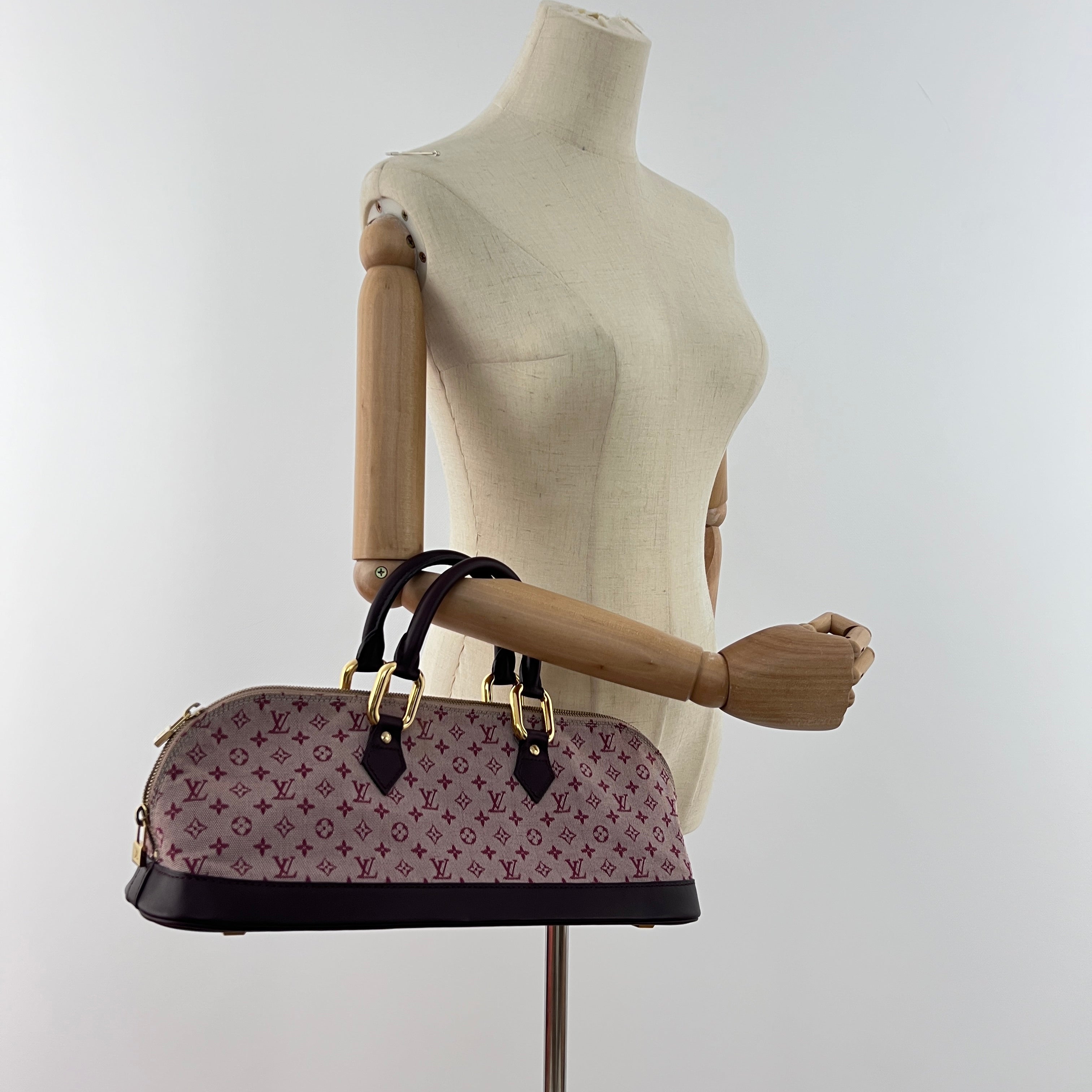 Sac à main LOUIS VUITTON Alma Long toile et cuir rose