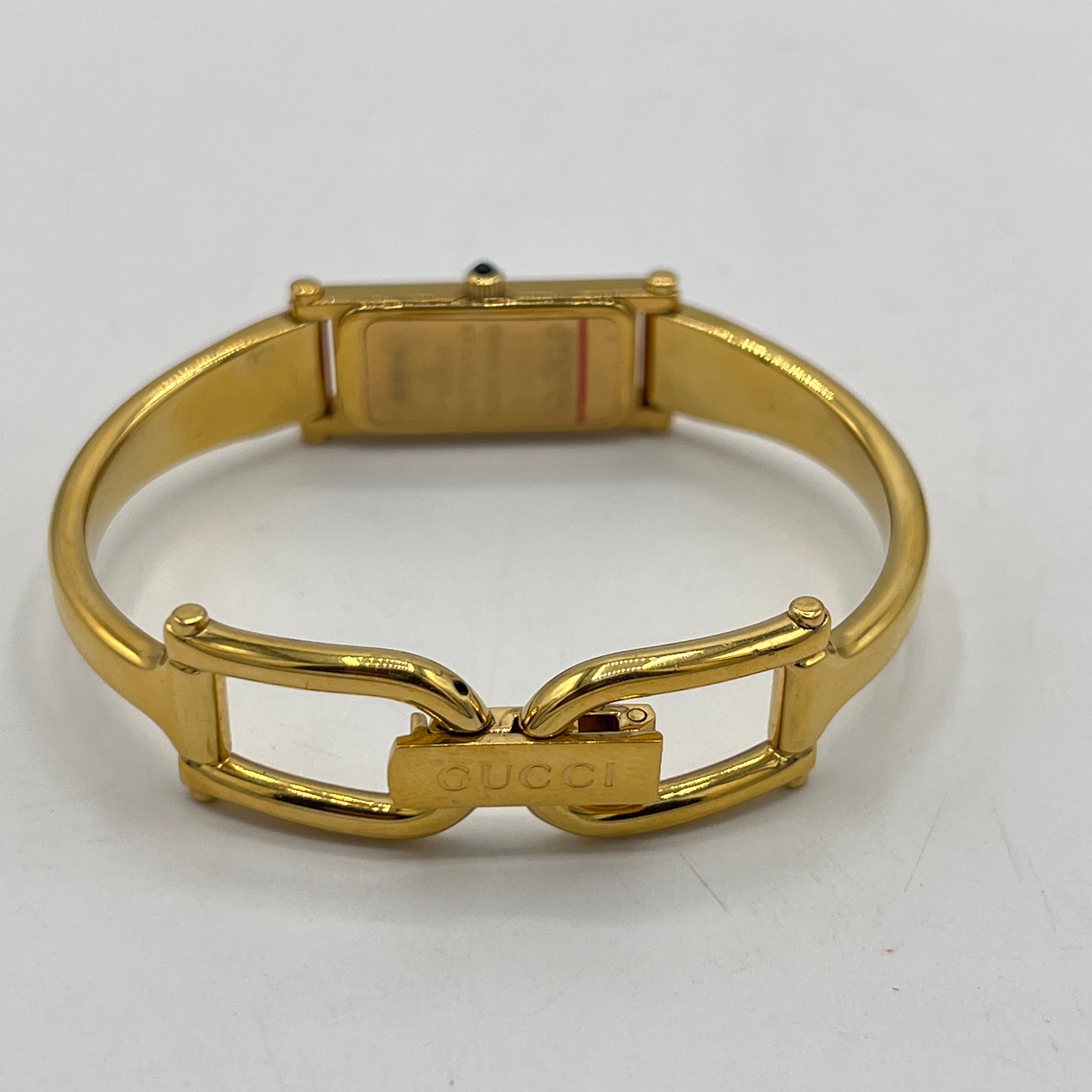 Montre GUCCI 1500 L plaqué or dorée