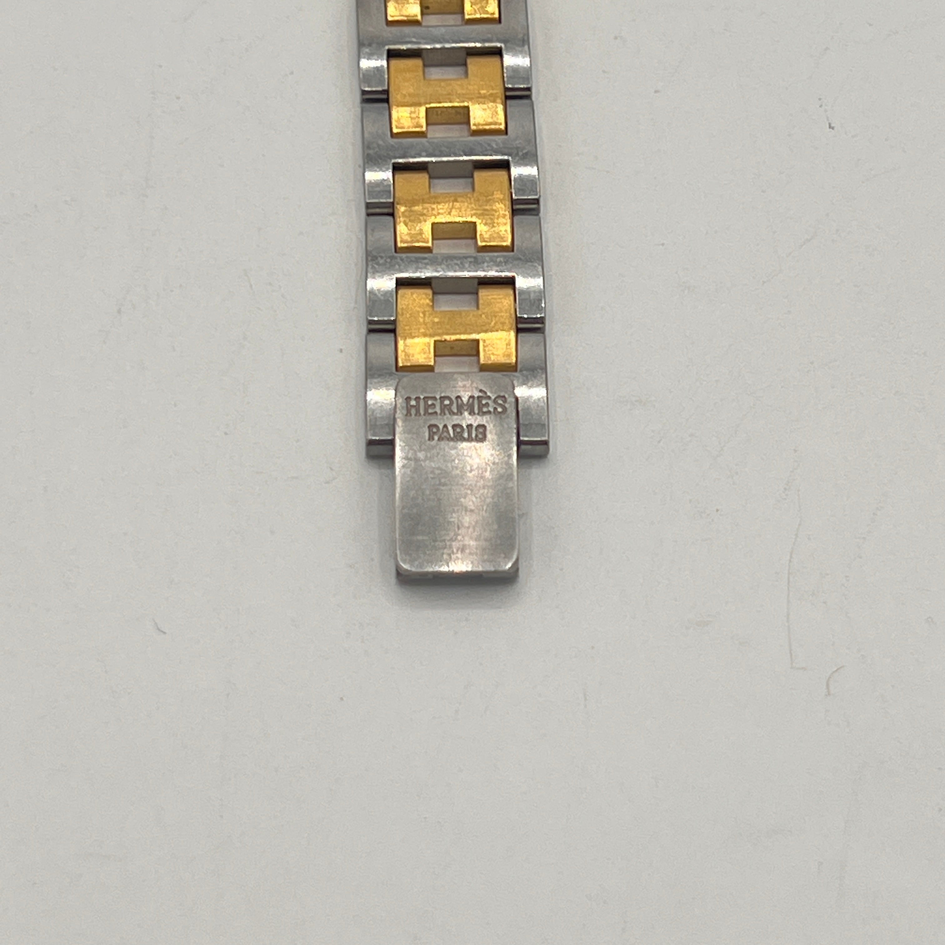 Montre HERMÈS Rallye plaqué or et acier bicolore
