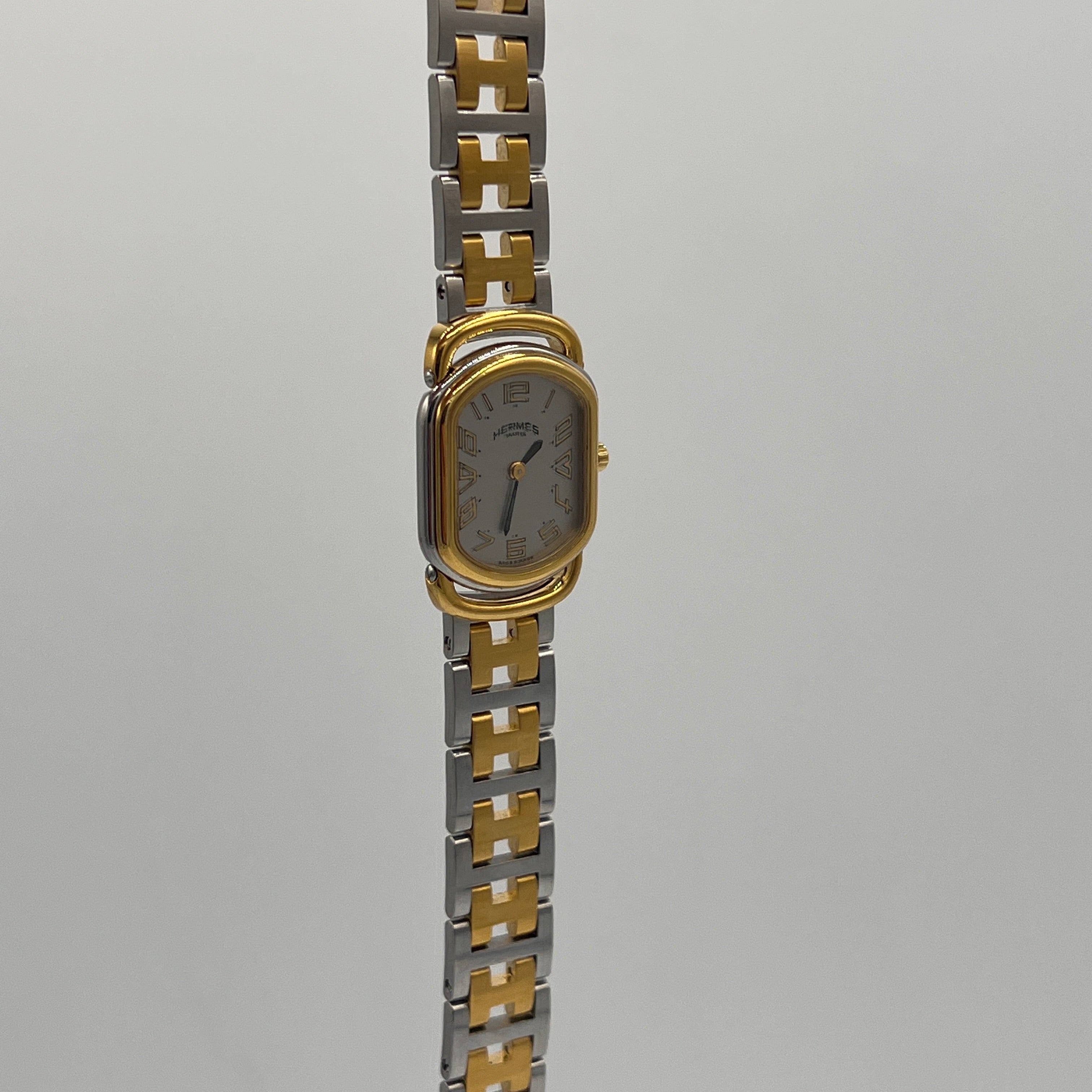 Montre HERMÈS Rallye plaqué or et acier bicolore