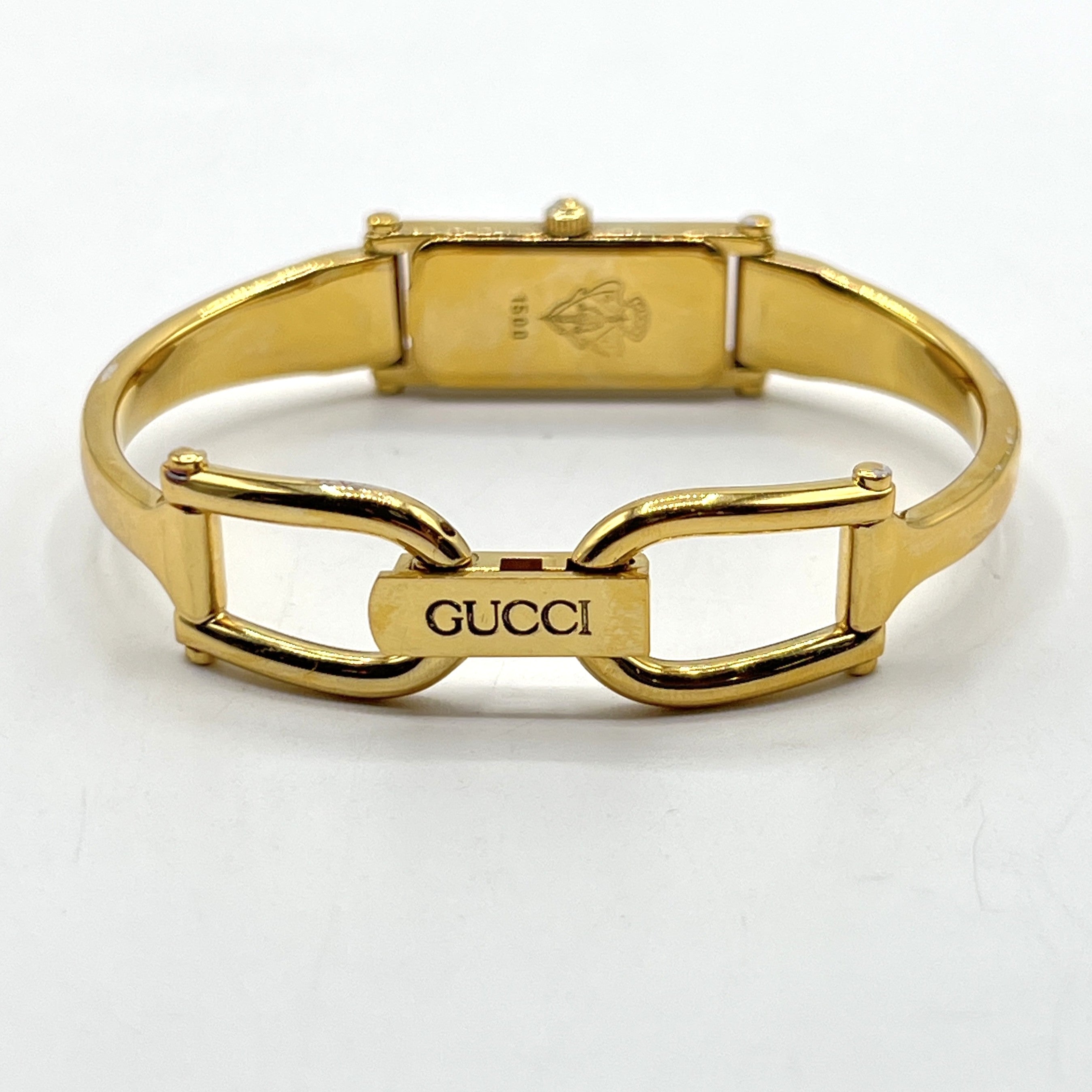 Montre GUCCI 1500 plaqué or doré