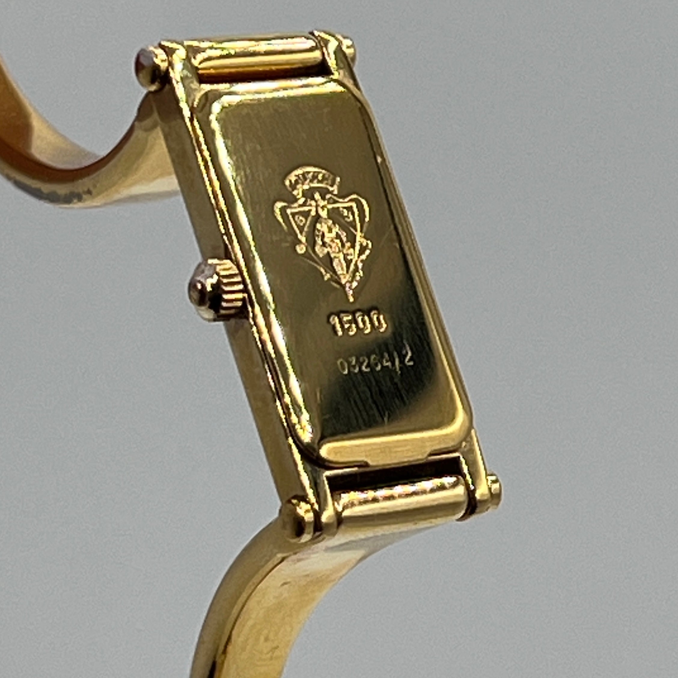 Montre GUCCI 1500 plaqué or doré