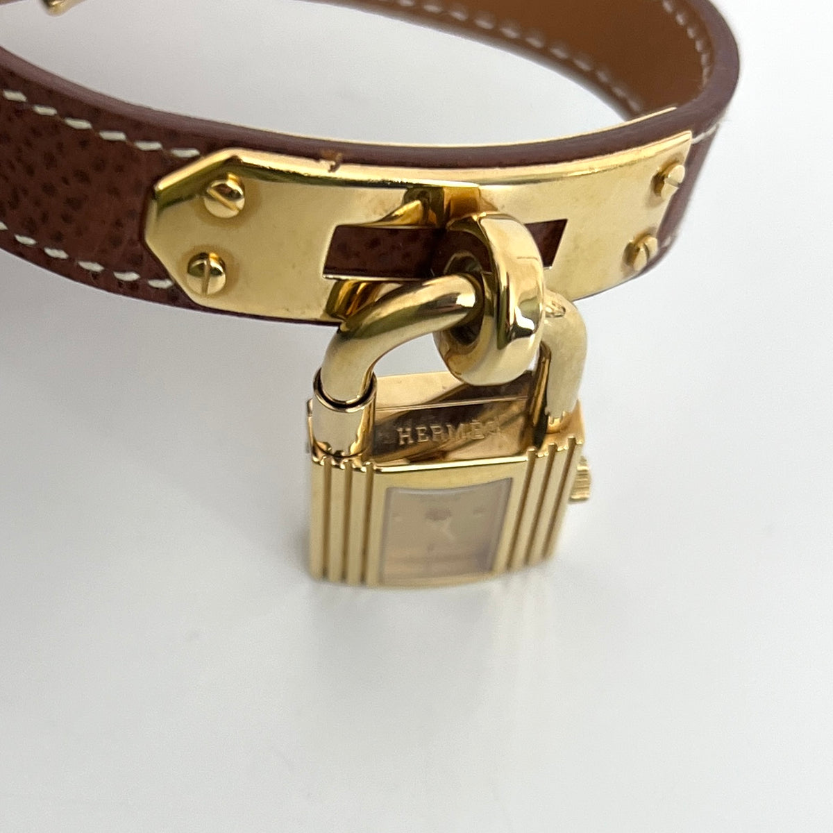 Montre HERMÈS Kelly plaqué or doré