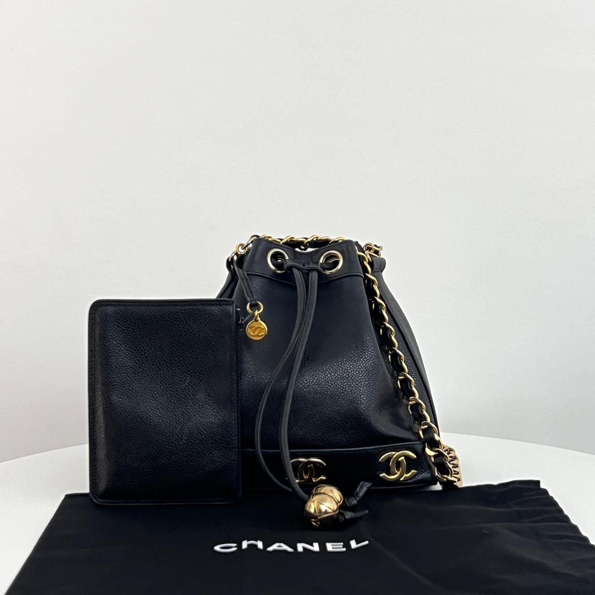 Vintage 1996-1997 CHANEL black lambskin mini bucket bag