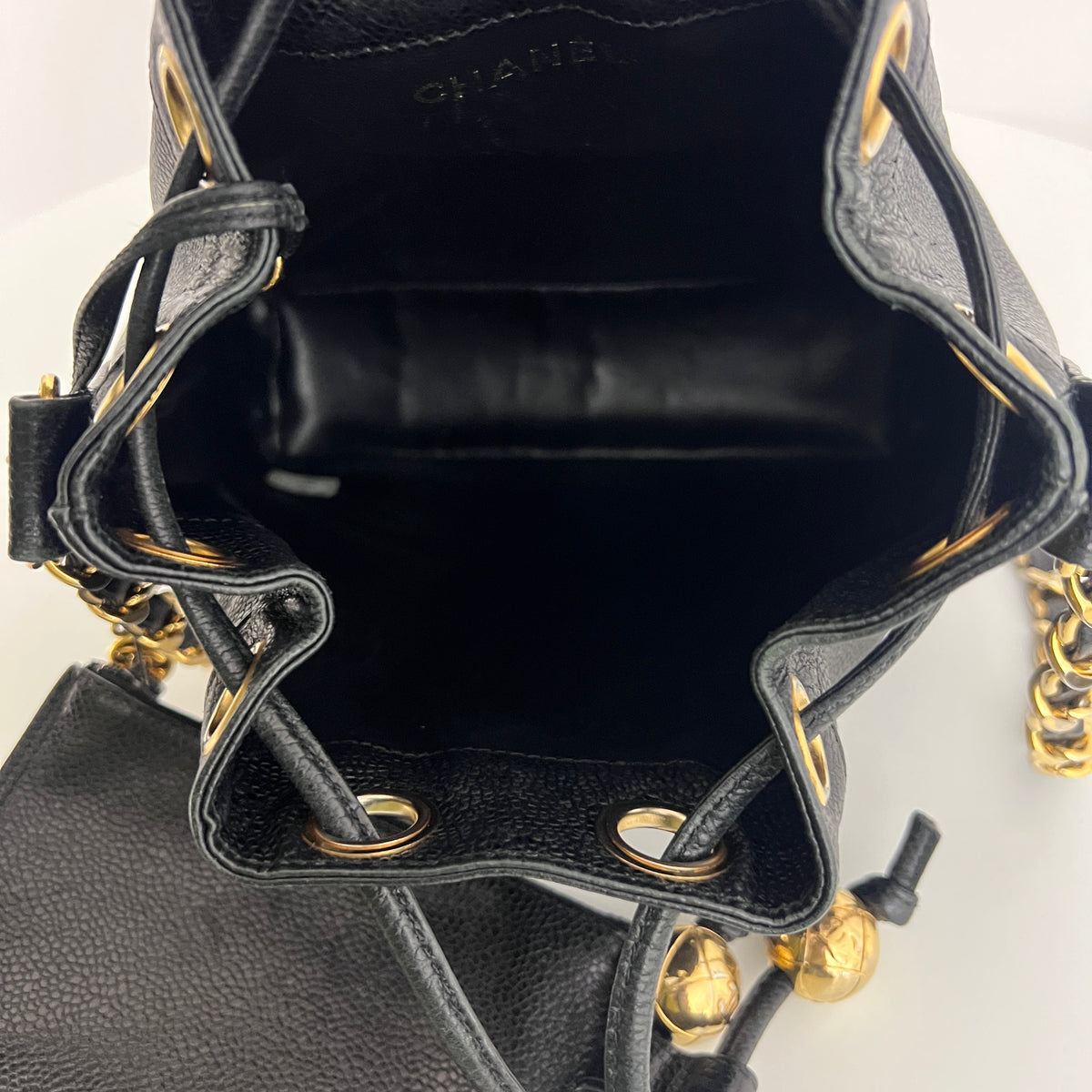 Vintage 1996-1997 CHANEL black lambskin mini bucket bag