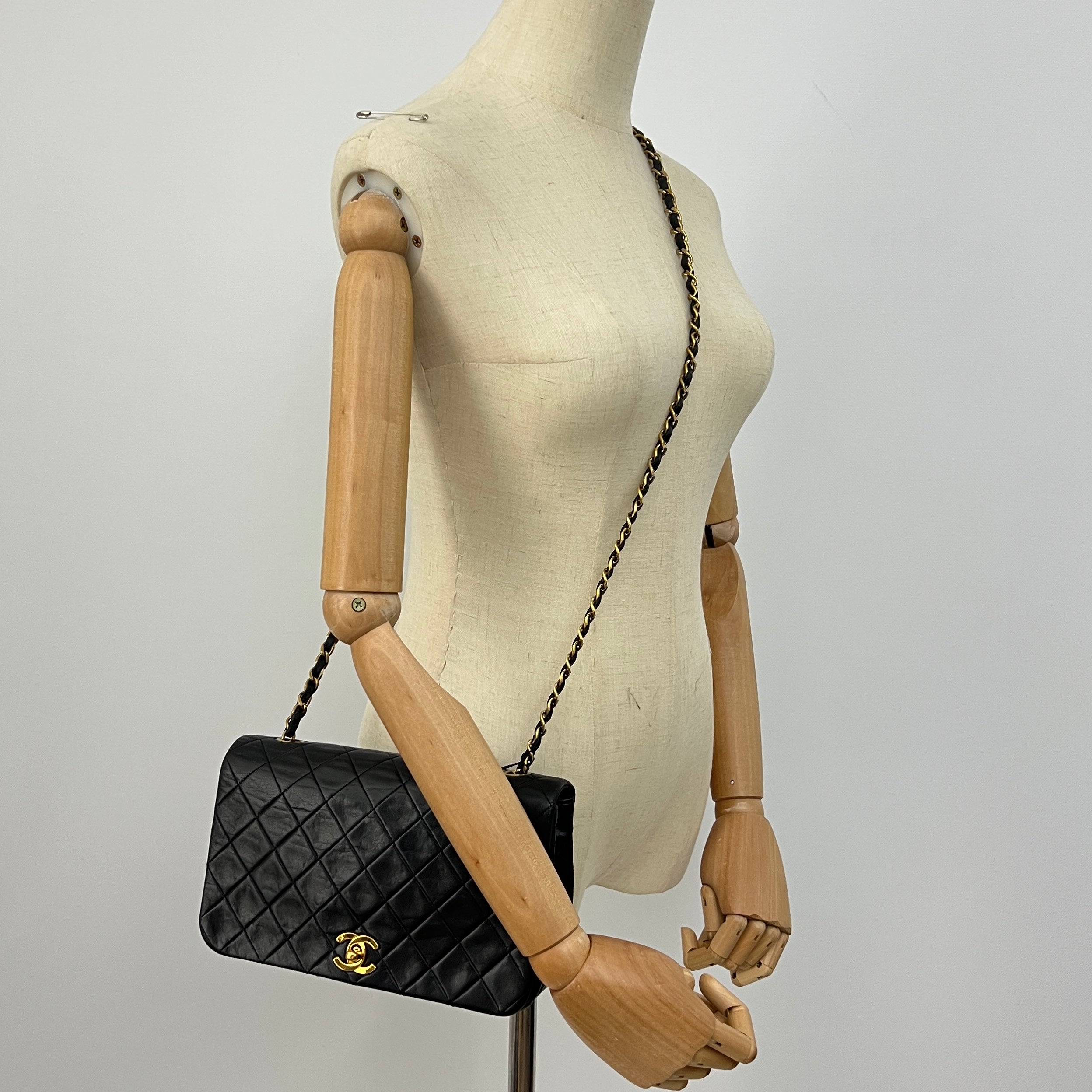 CHANEL Classic Small Shoulder Bag in black lambskin