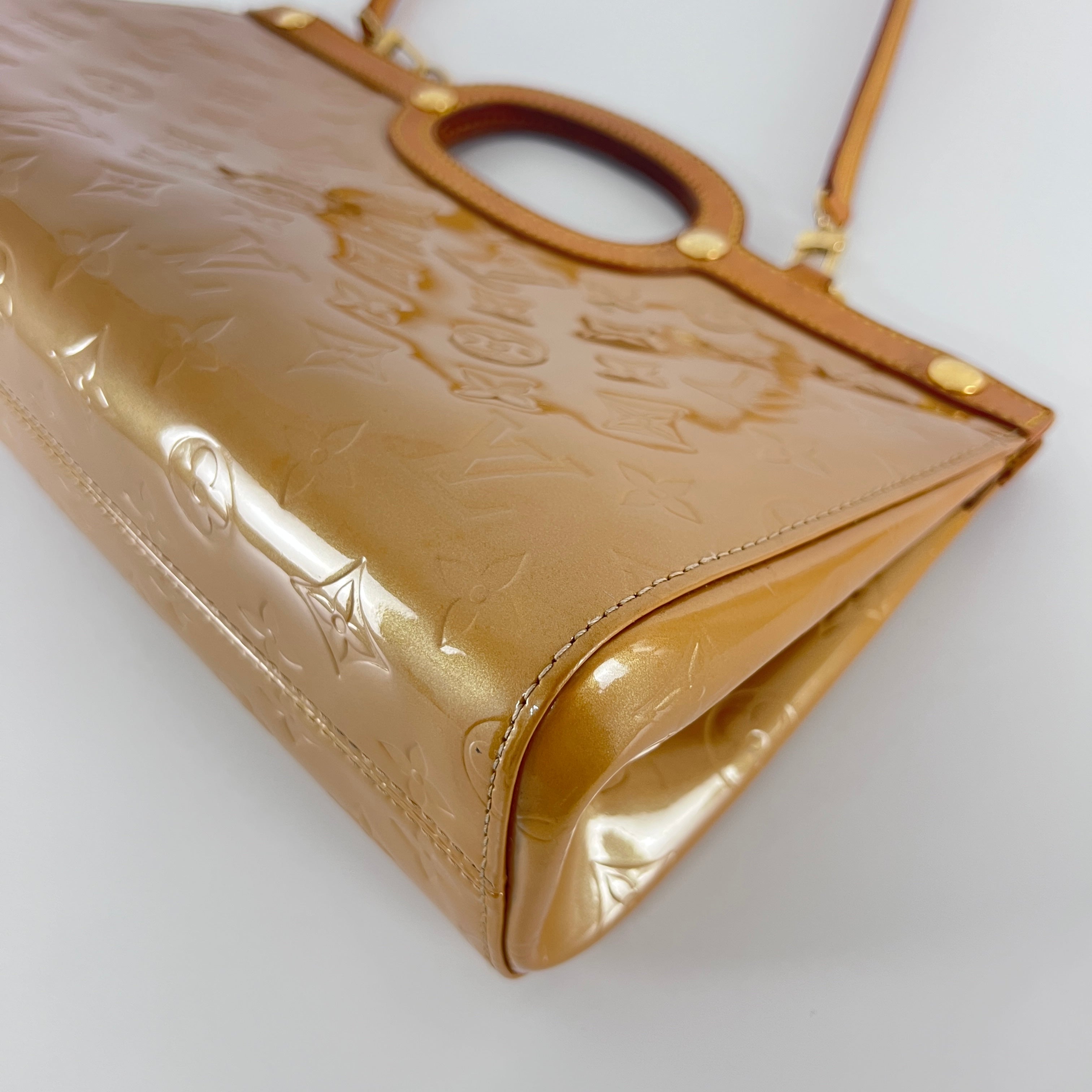 LOUIS VUITTON Roxbury handbag in brown patent leather