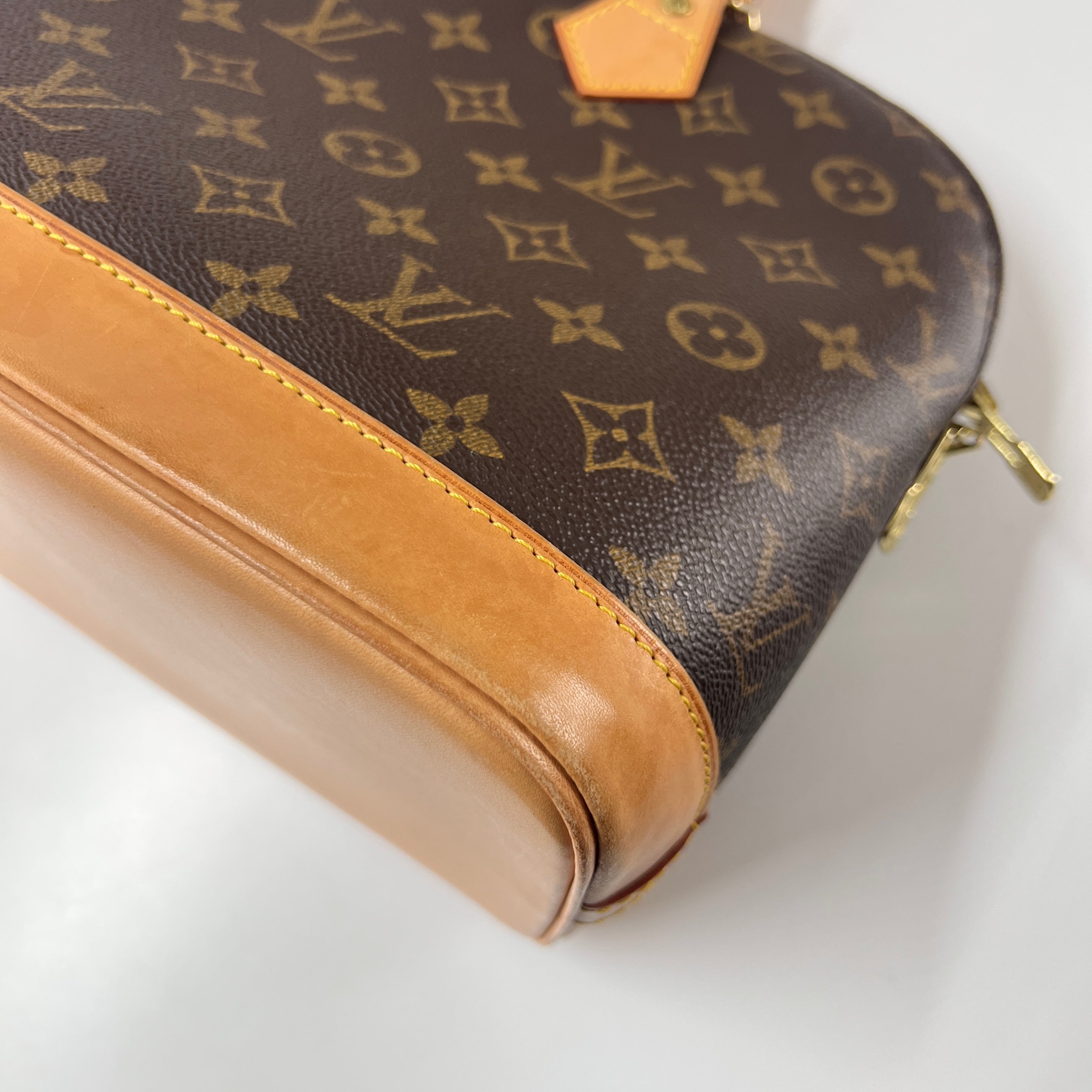 Sac à main LOUIS VUITTON Alma toile et cuir marron