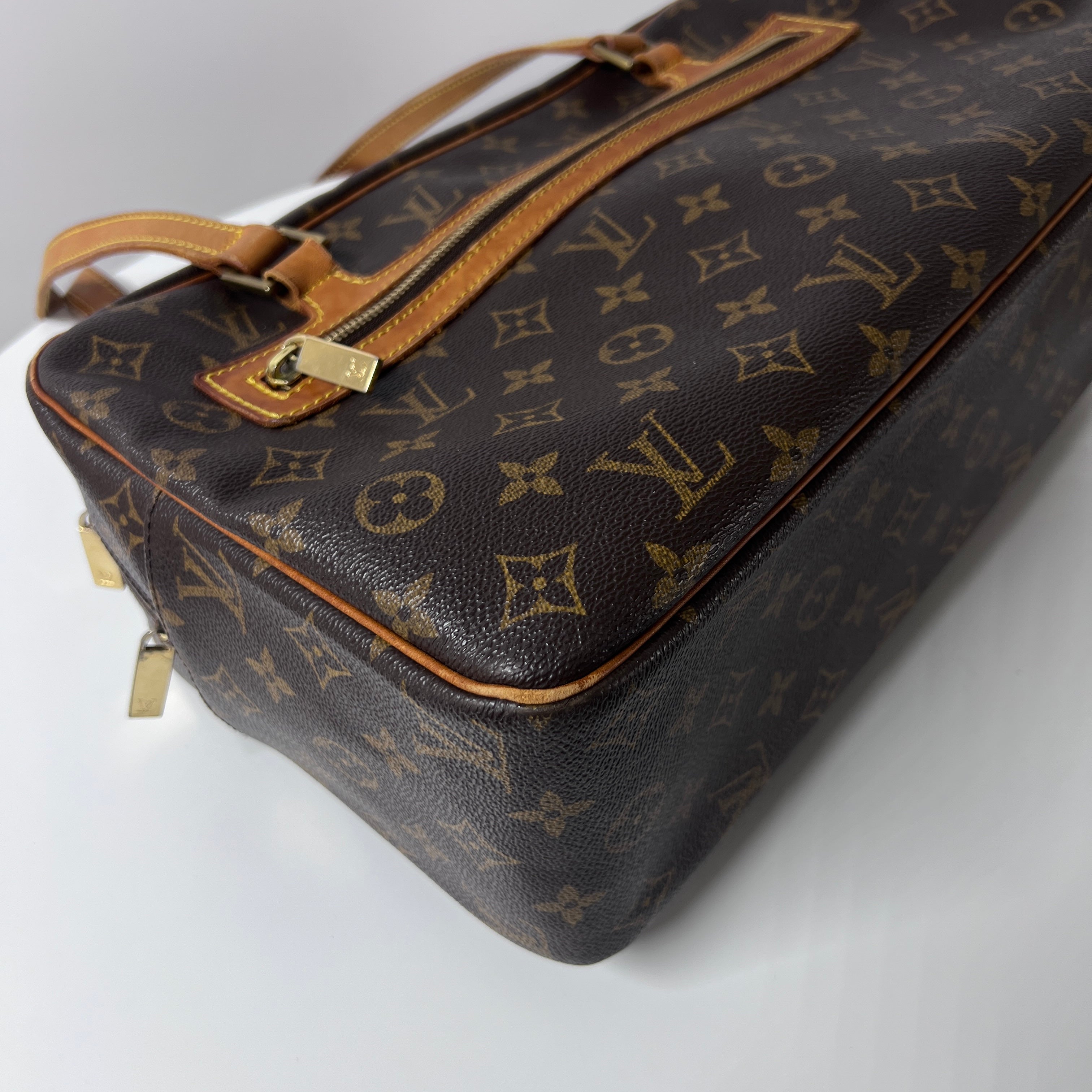 Sac à main LOUIS VUITTON Cité MM toile et cuir marron
