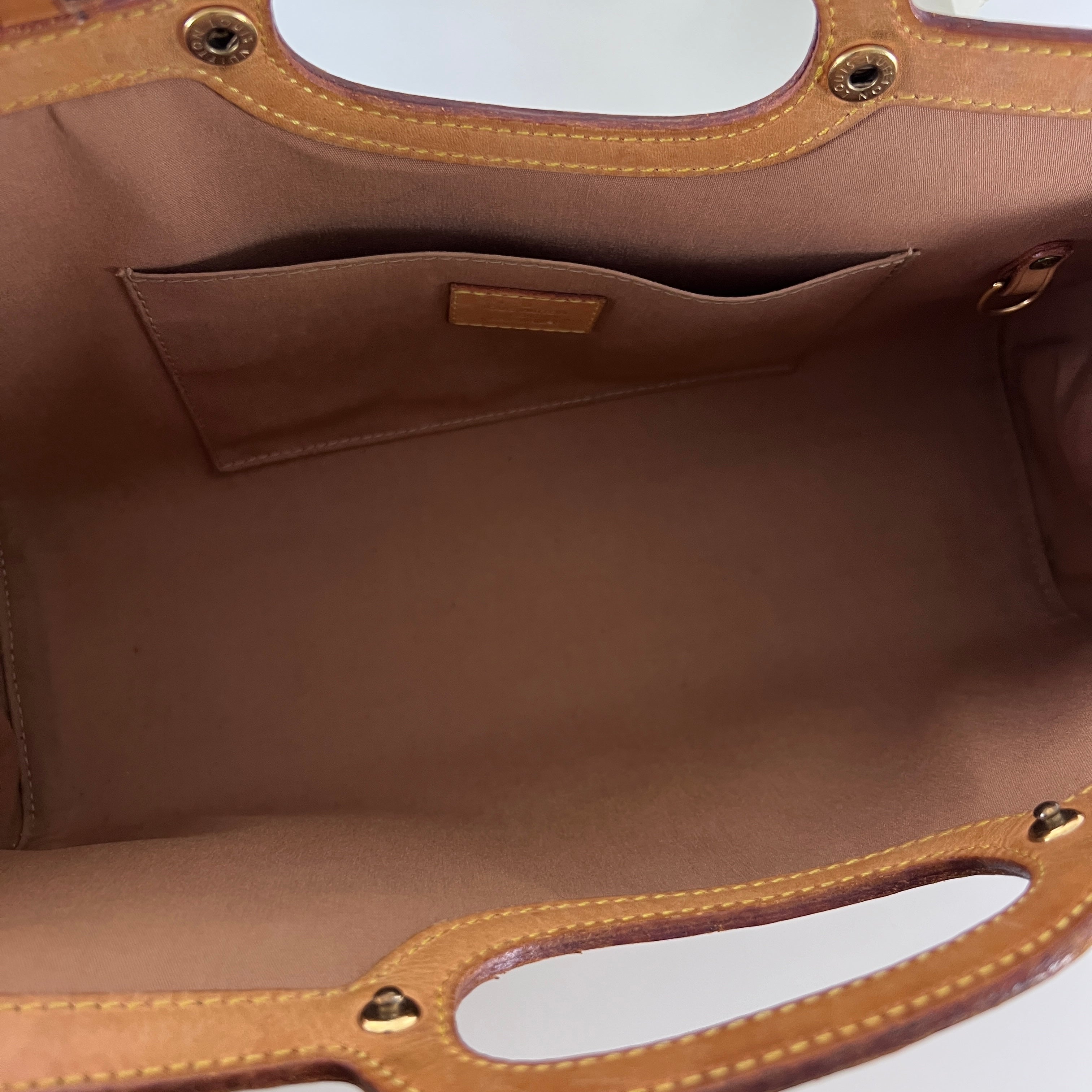LOUIS VUITTON Roxbury handbag in brown patent leather