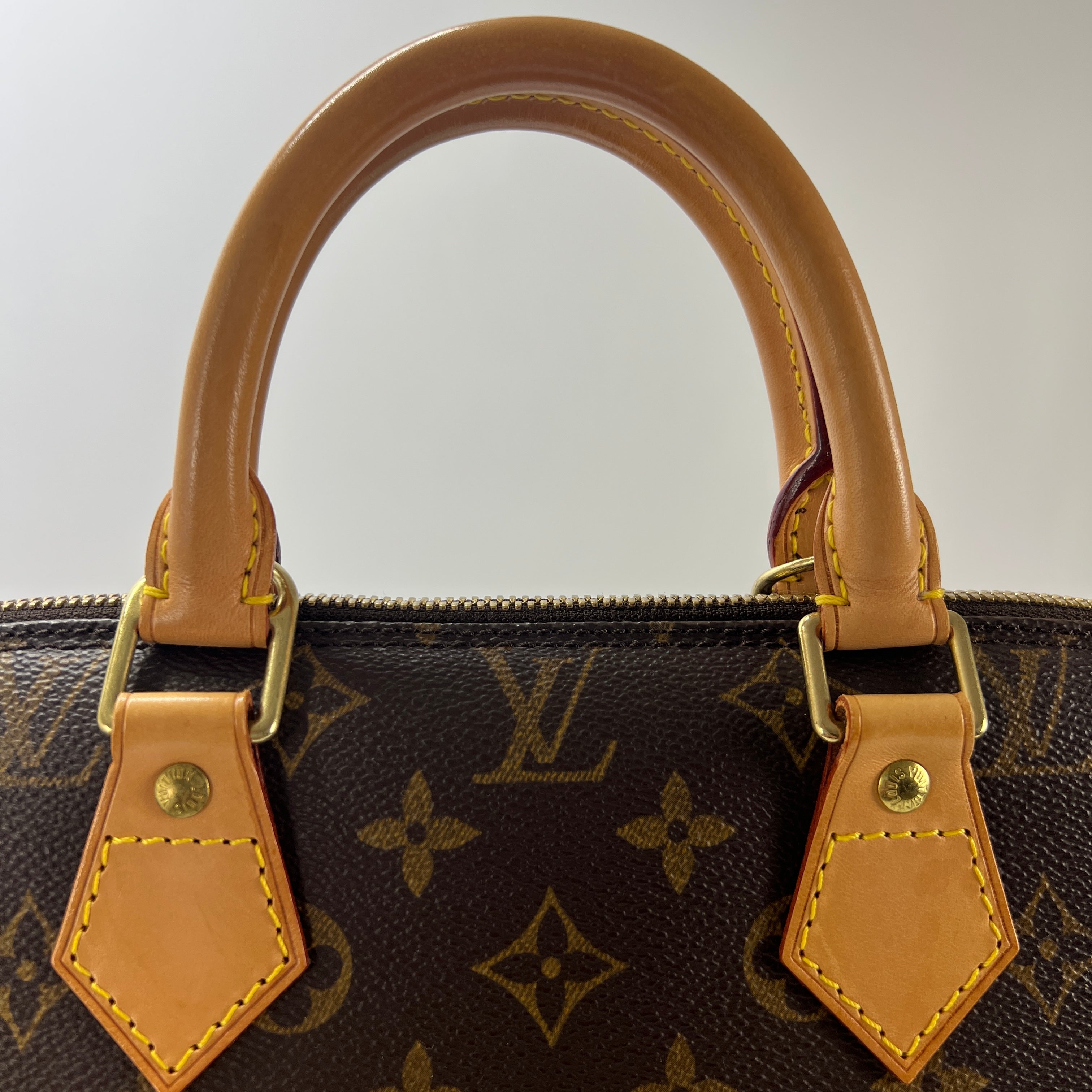 Sac à main LOUIS VUITTON Alma toile et cuir marron