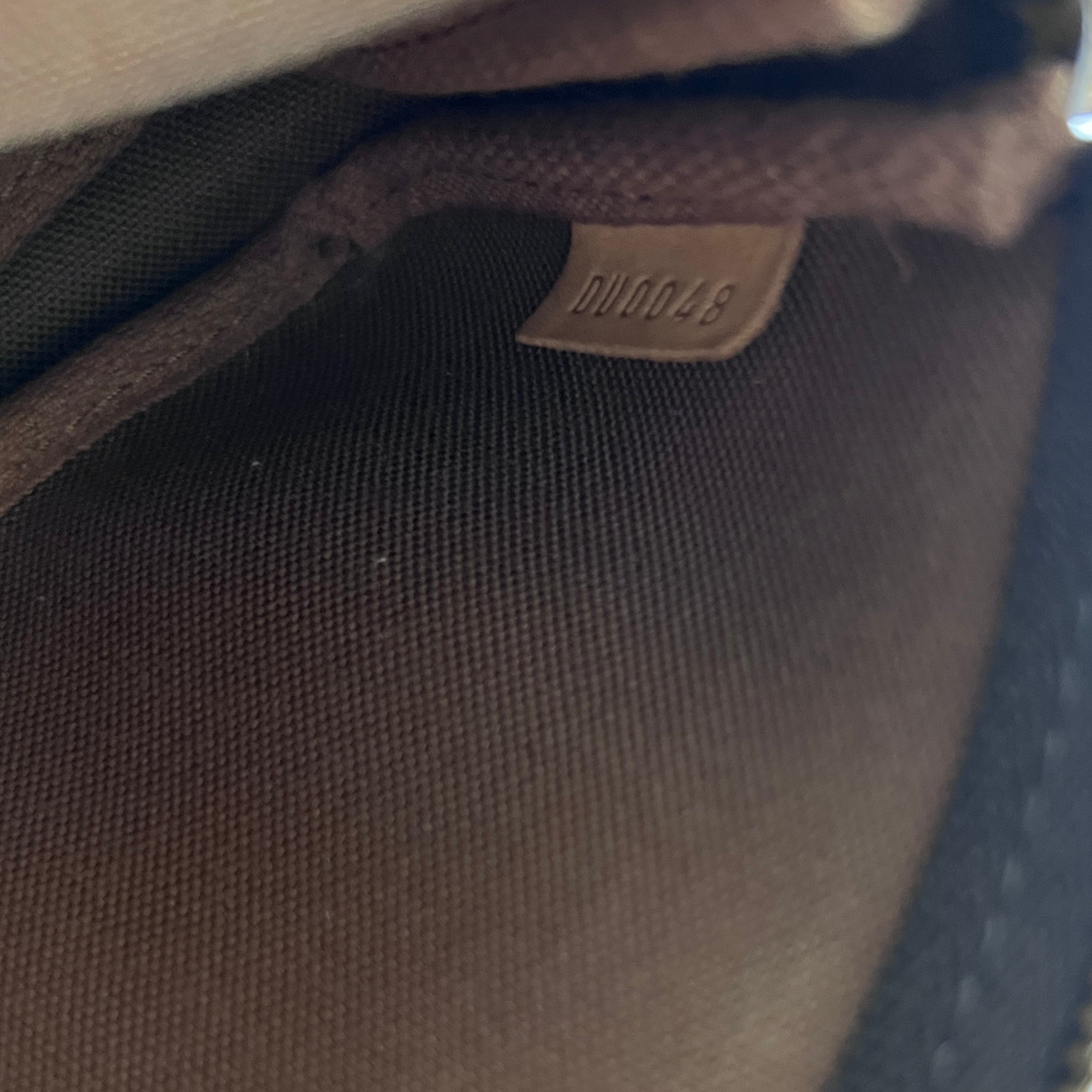 Sac à main LOUIS VUITTON Accessory Pouch toile et cuir marron