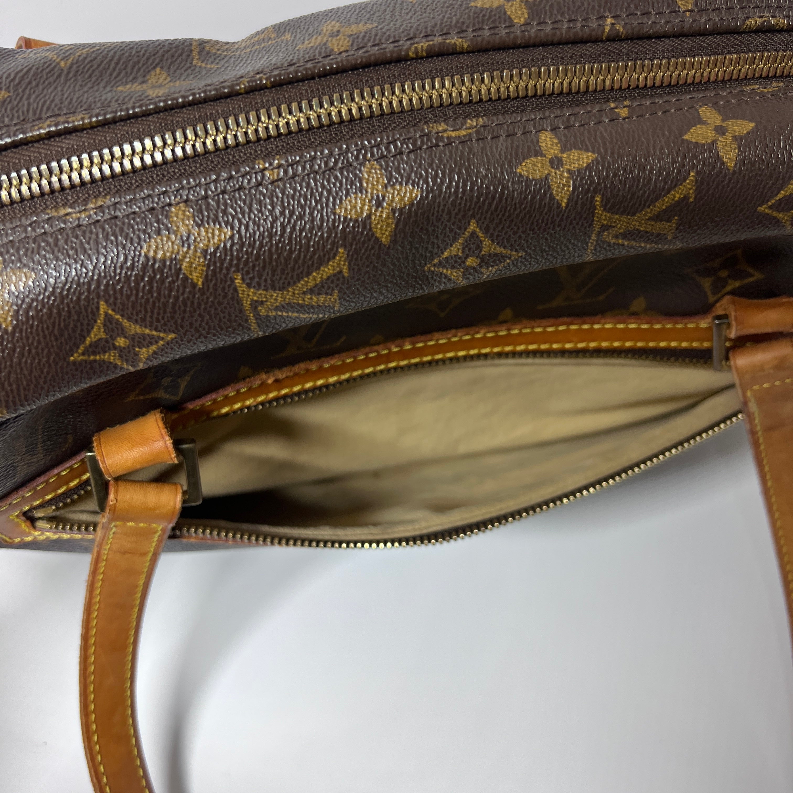 Sac à main LOUIS VUITTON Cité MM toile et cuir marron