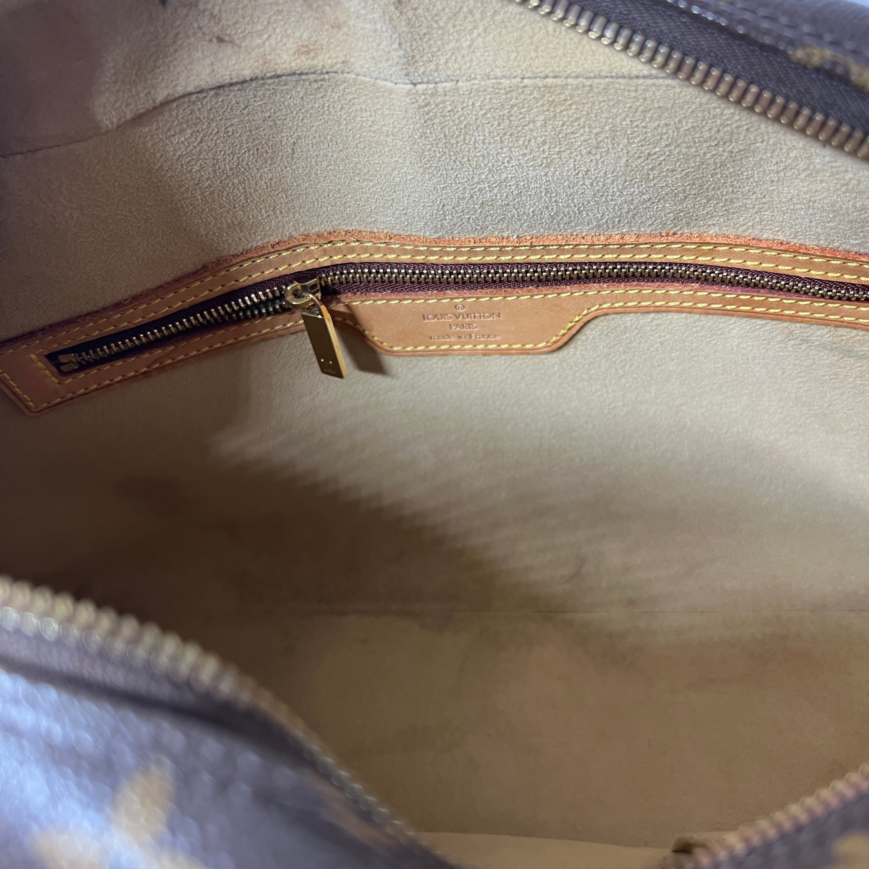 Sac à main LOUIS VUITTON Cité MM toile et cuir marron