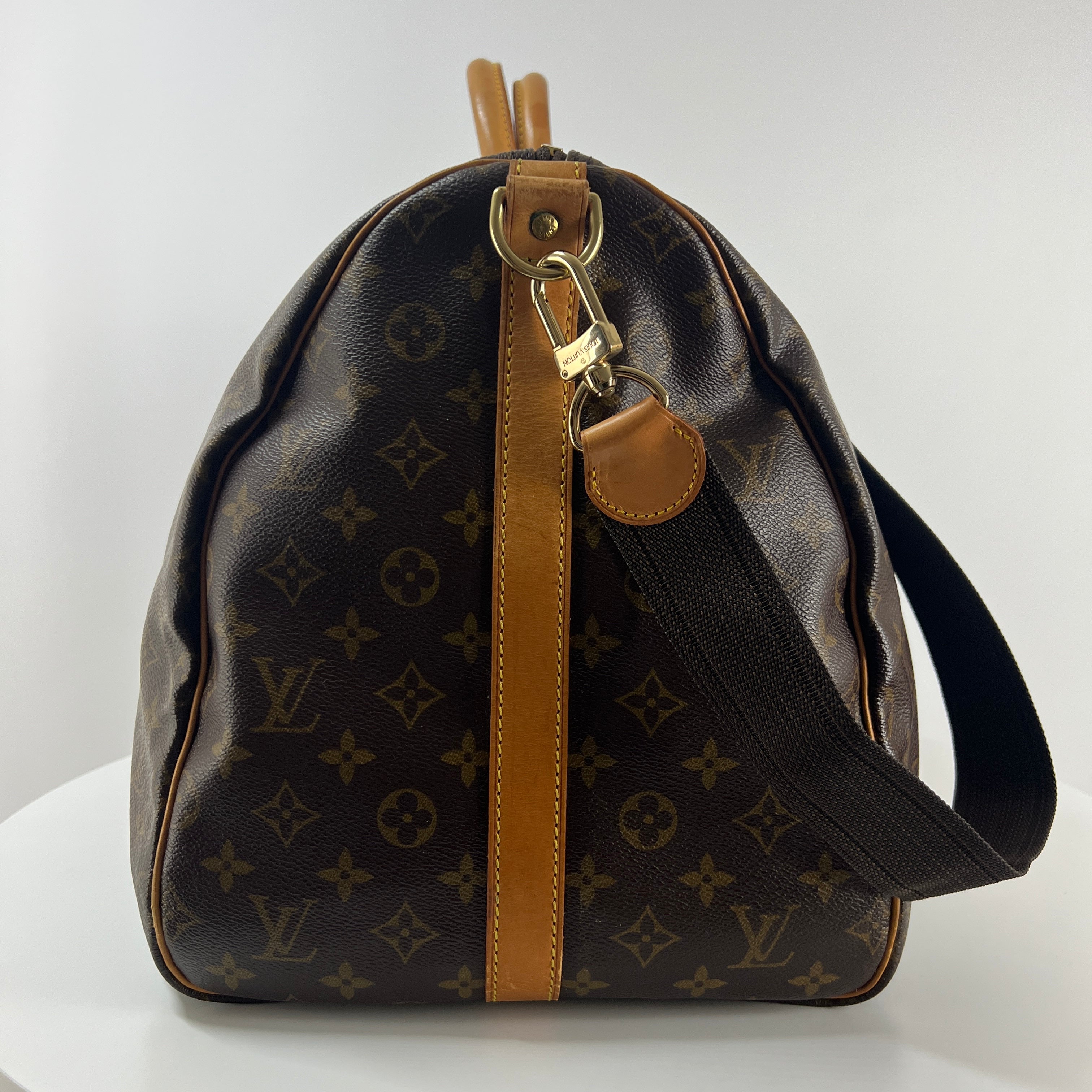 LOUIS VUITTON Keepall 55 canvas and brown leather handbag