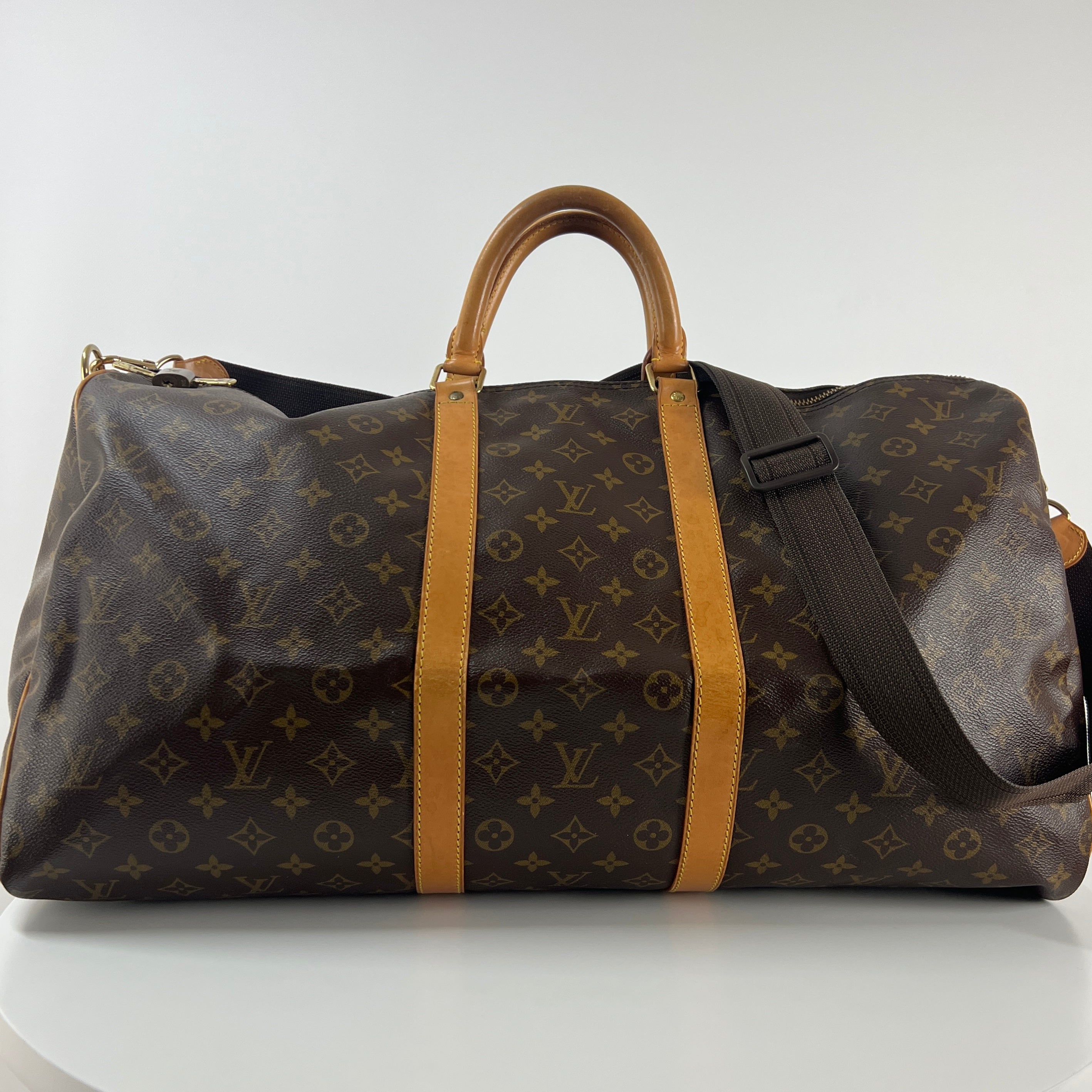 LOUIS VUITTON Keepall 55 canvas and brown leather handbag