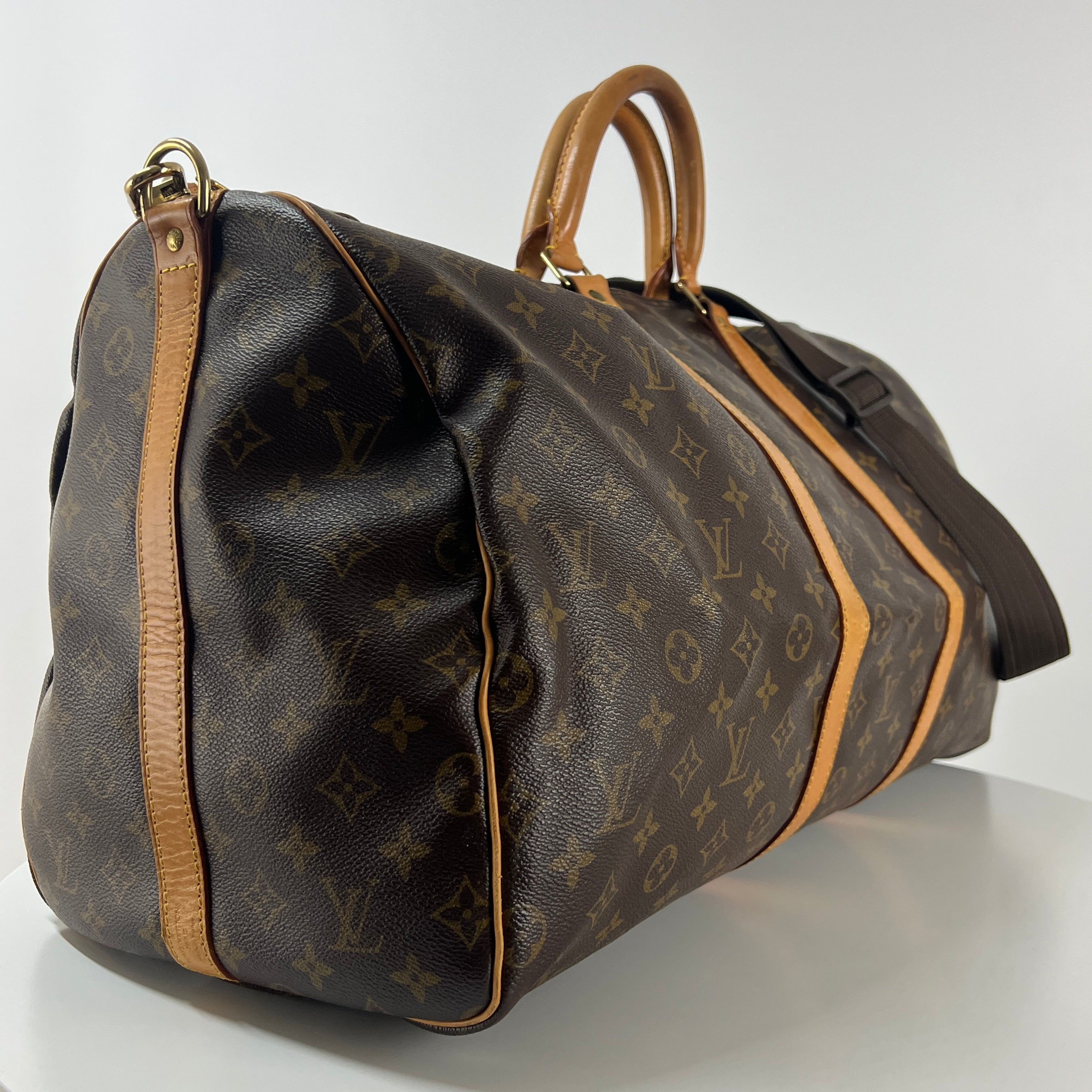 LOUIS VUITTON Keepall 55 canvas and brown leather handbag