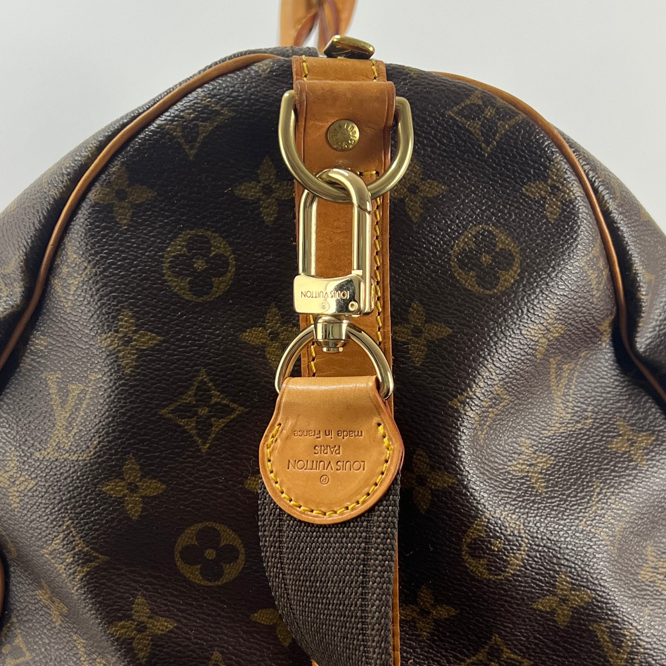 LOUIS VUITTON Keepall 55 canvas and brown leather handbag