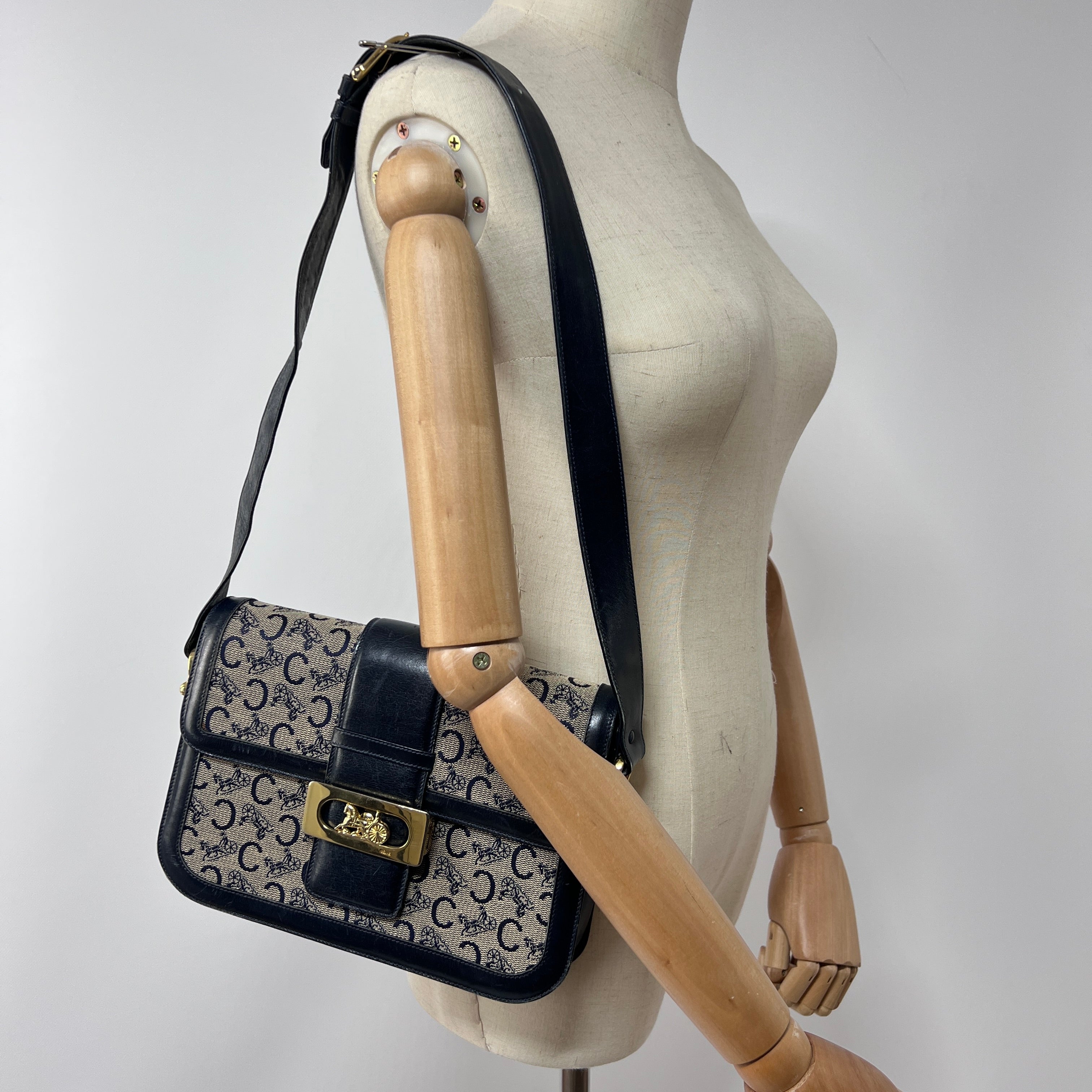 CELINE Triomphe canvas and navy leather handbag