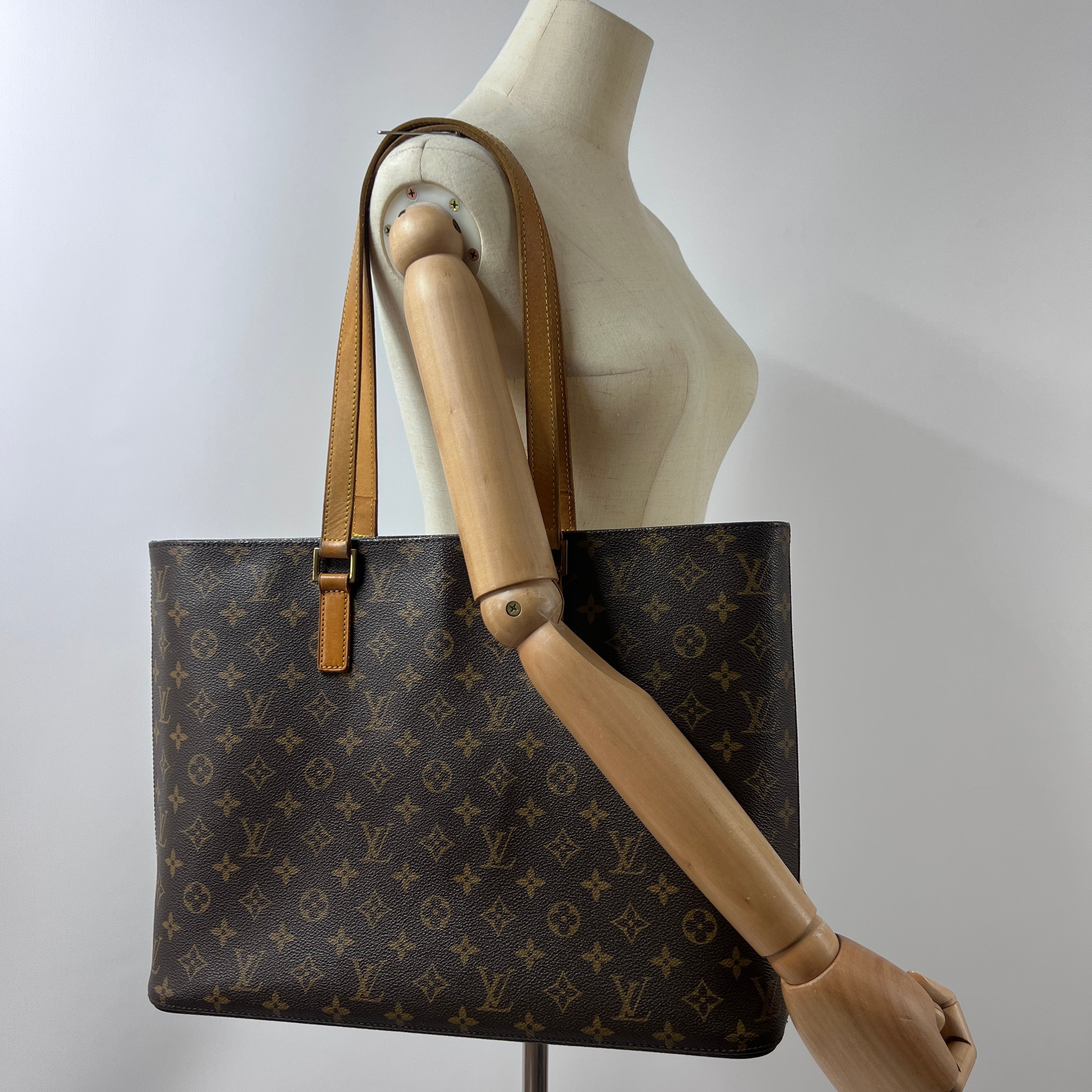 Sac à main LOUIS VUITTON Luco toile et cuir marron