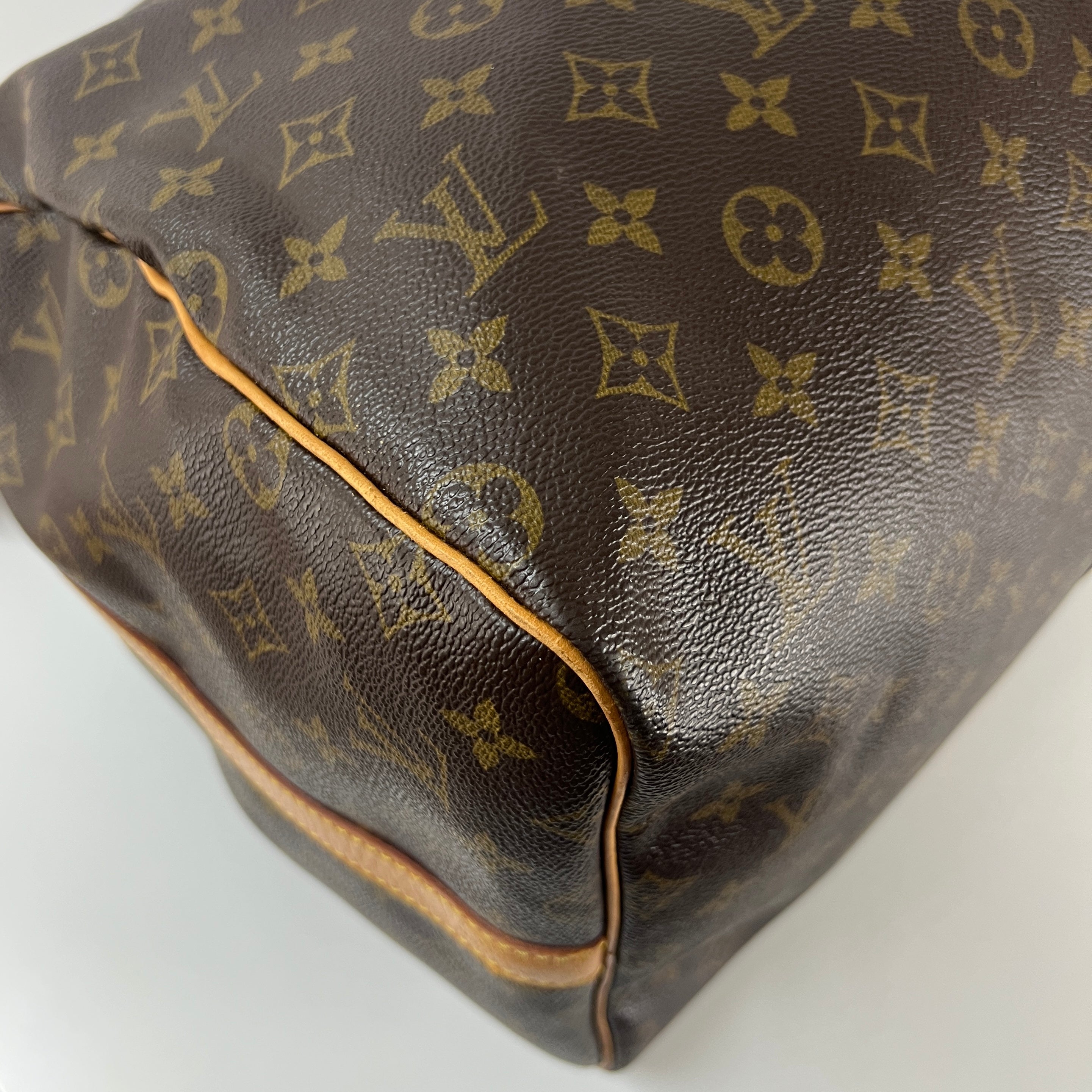 LOUIS VUITTON Keepall 55 canvas and brown leather handbag