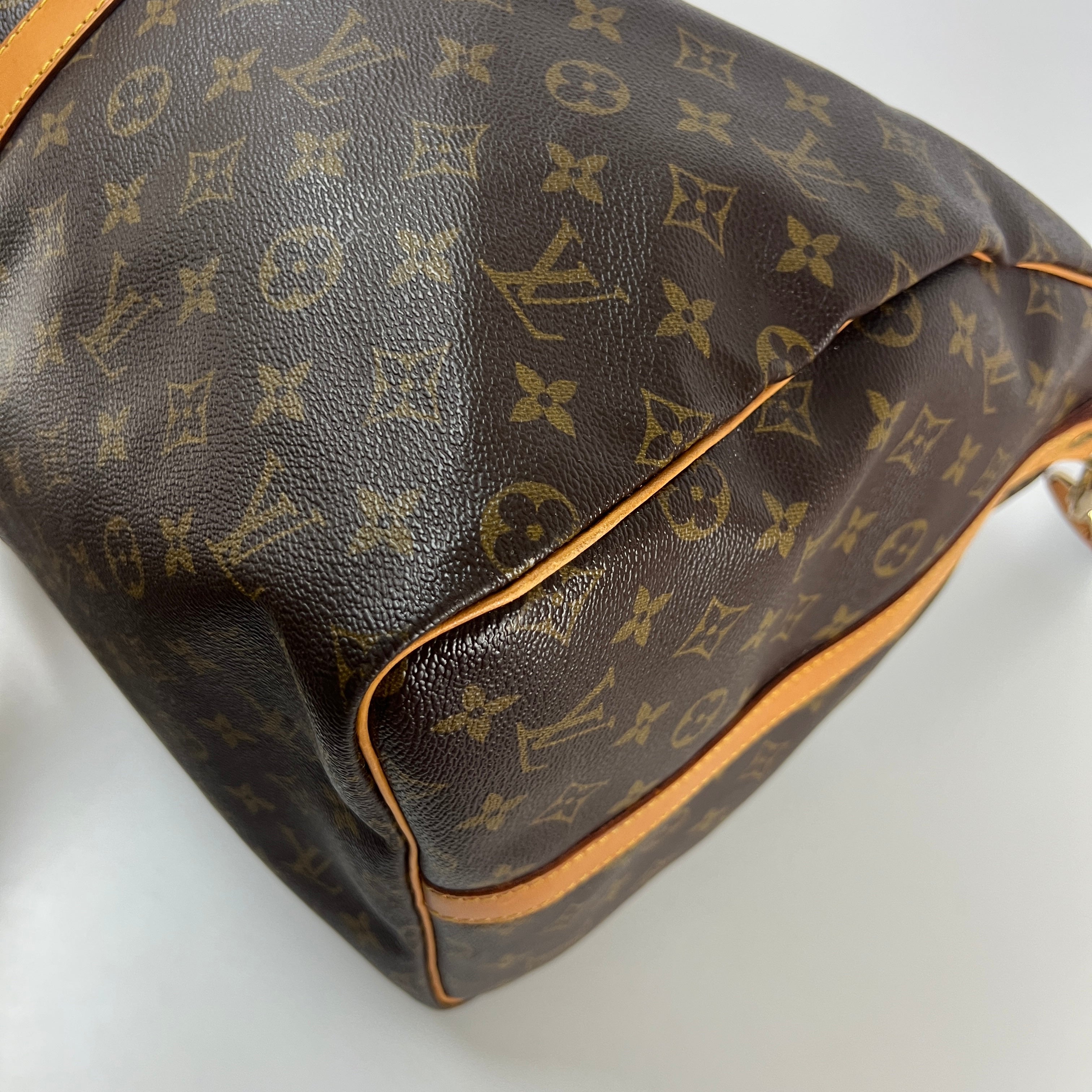 LOUIS VUITTON Keepall 55 canvas and brown leather handbag